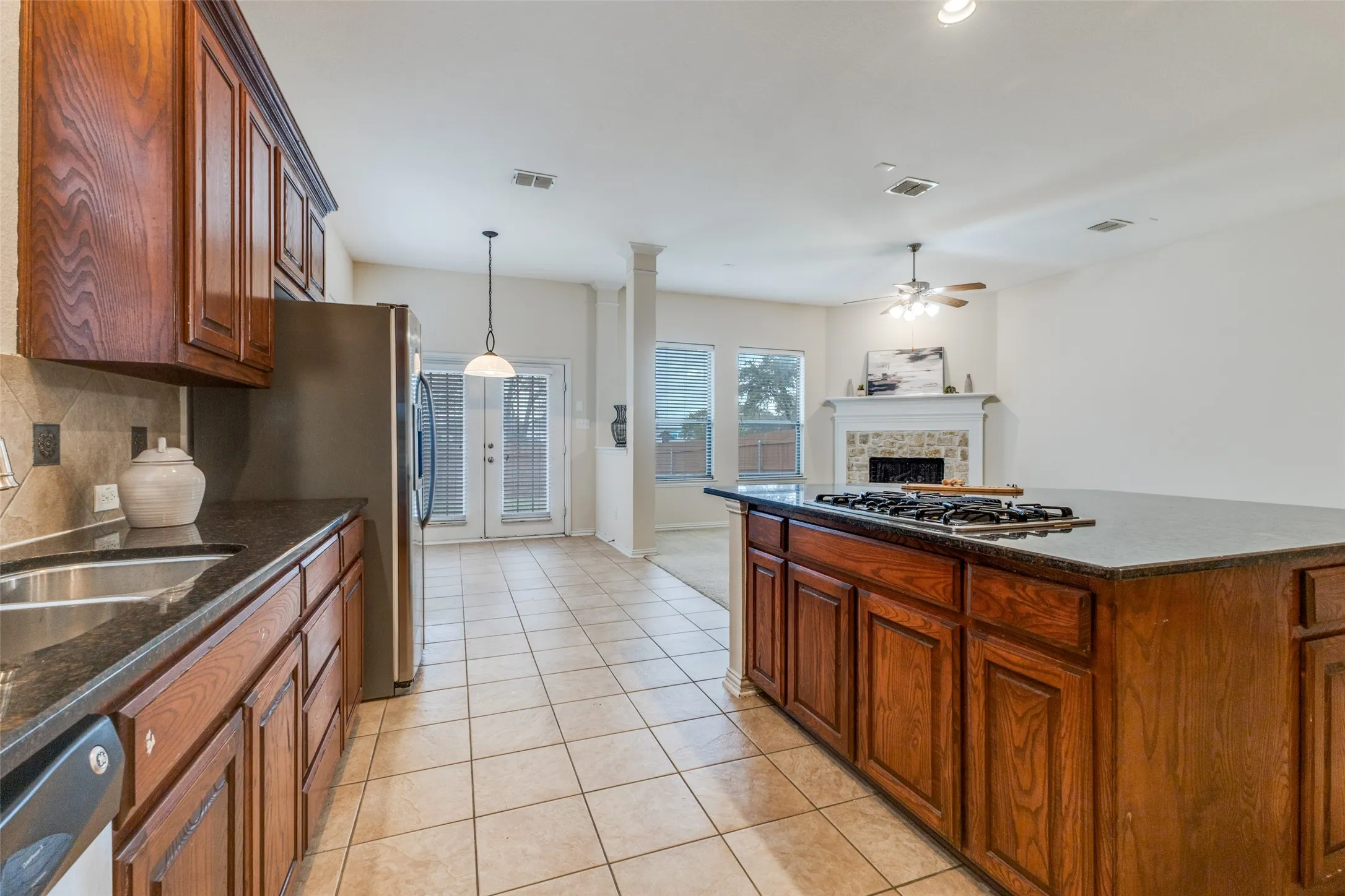 Enjoy the open floor plan of this kitchen-dining-family room space as well as lots of natural light.