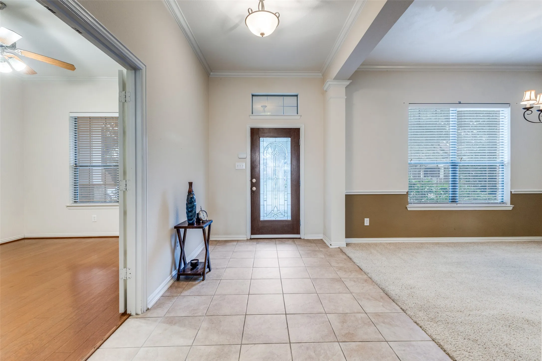 The welcoming foyer opens up to both the flex space (study) with French doors and large diniing area. Enjoy lots of natural light!
