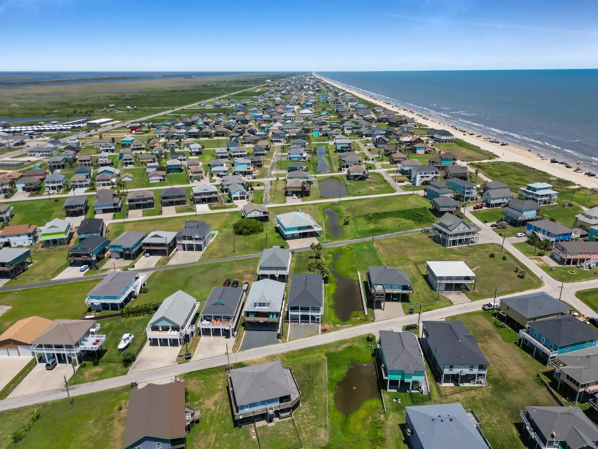 Coastal community setting with properties offering direct beach access and individual drives