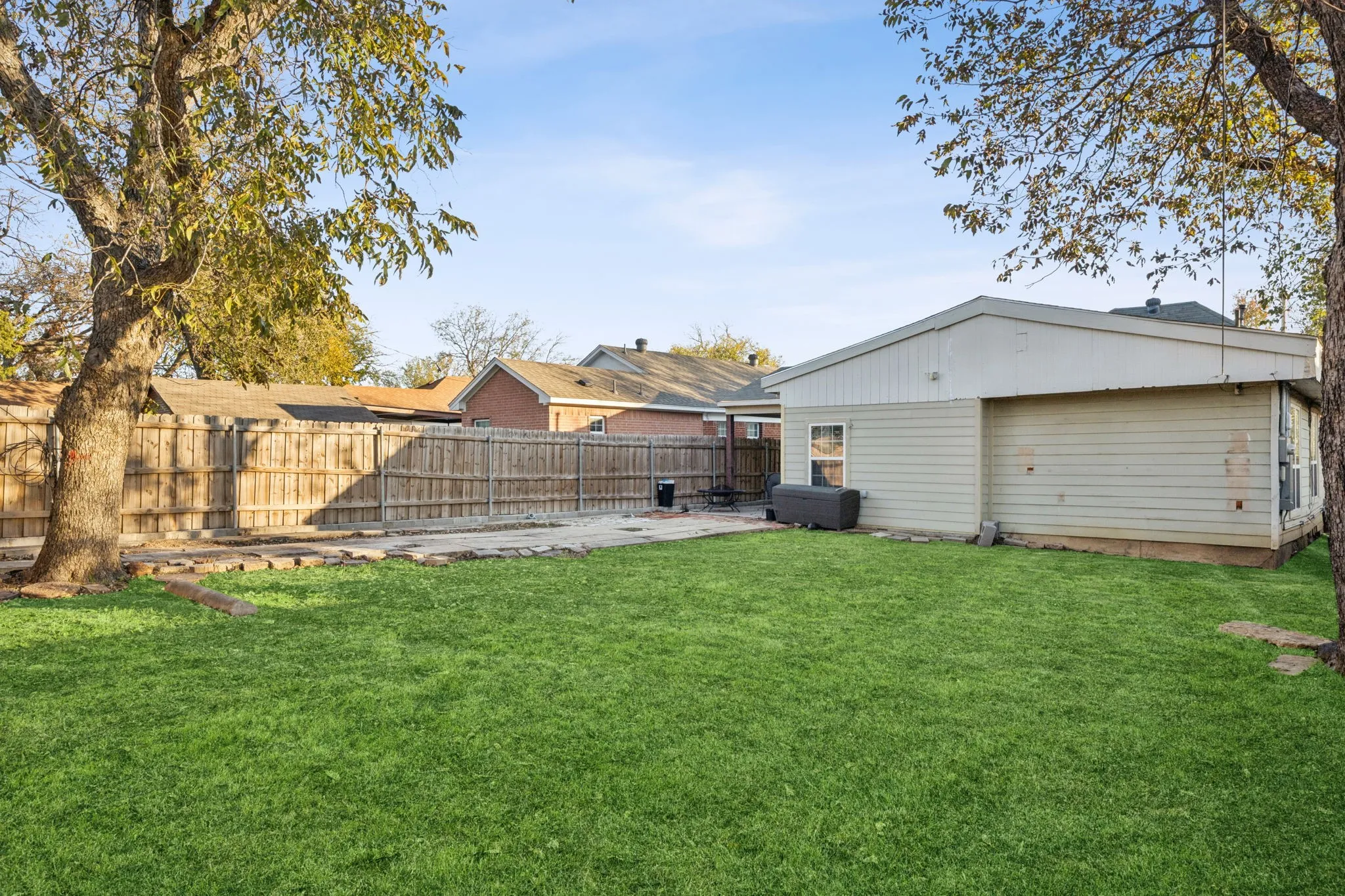 View of fenced backyard