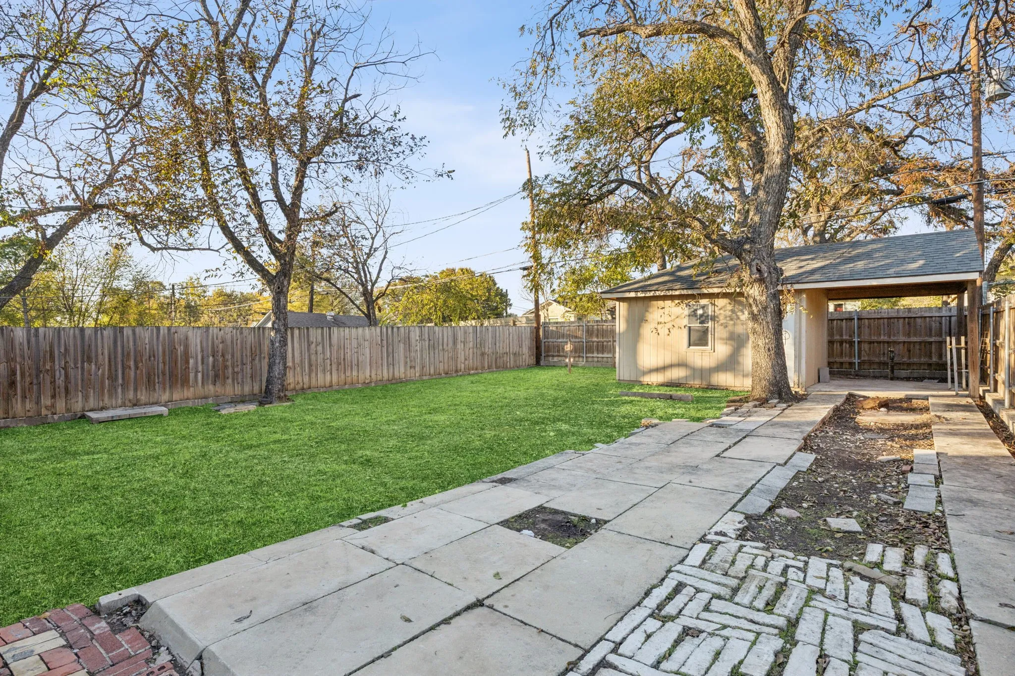 View of fenced backyard