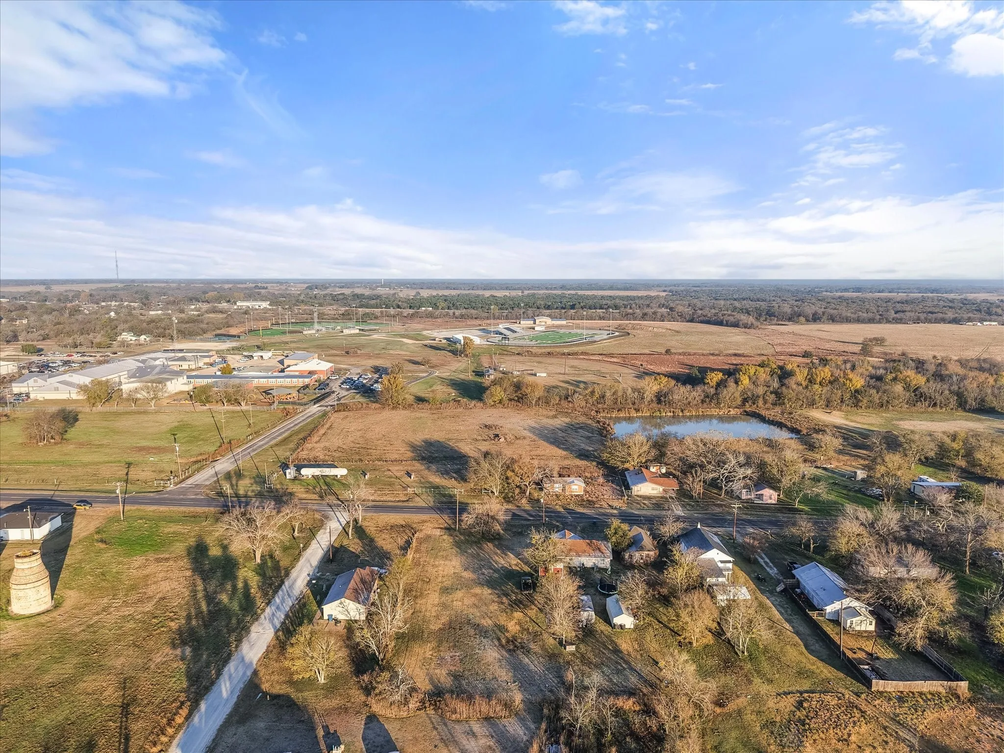 Aerial view of property's location with rural landscape