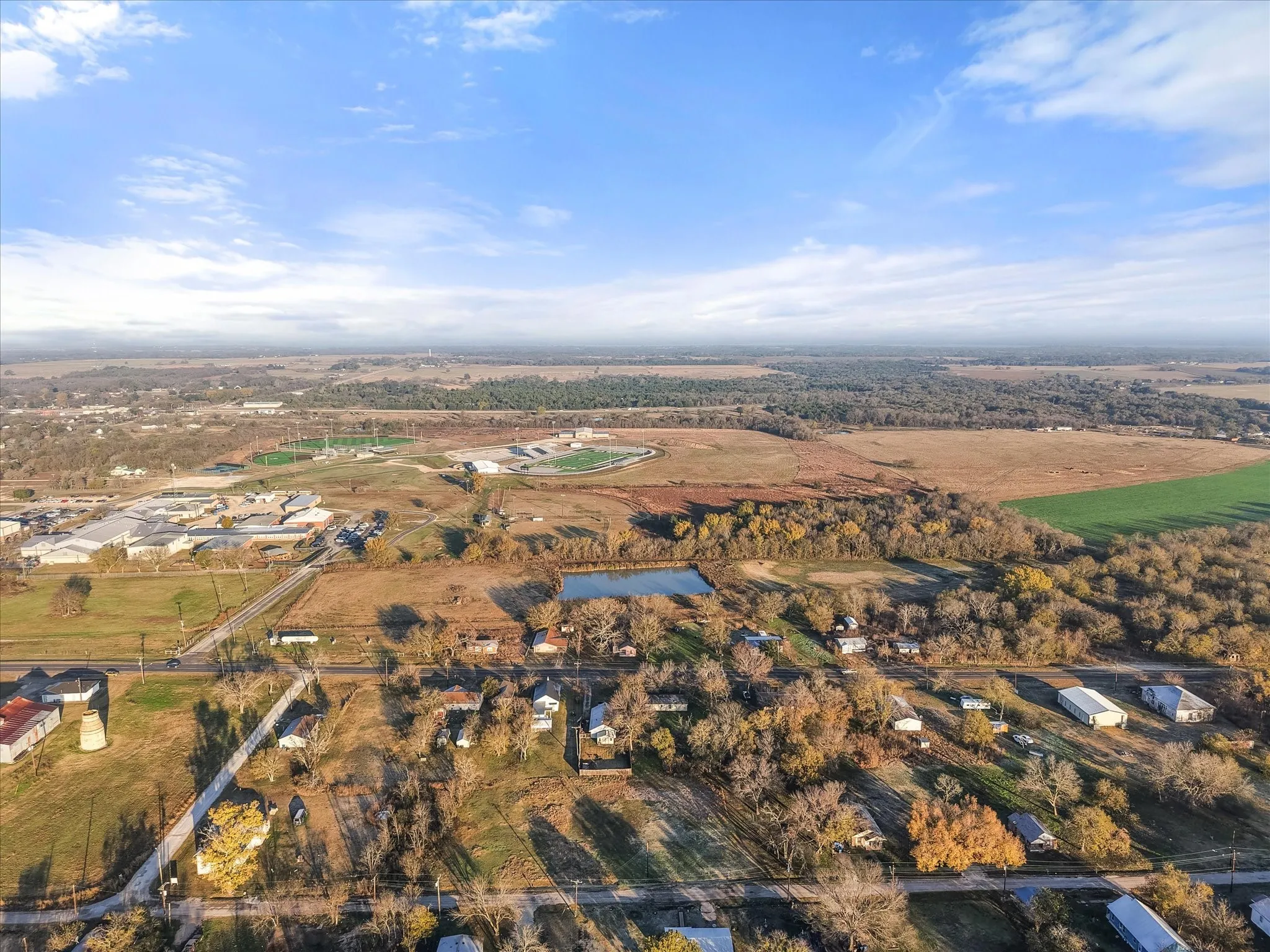 Aerial overview of property's location with rural landscape