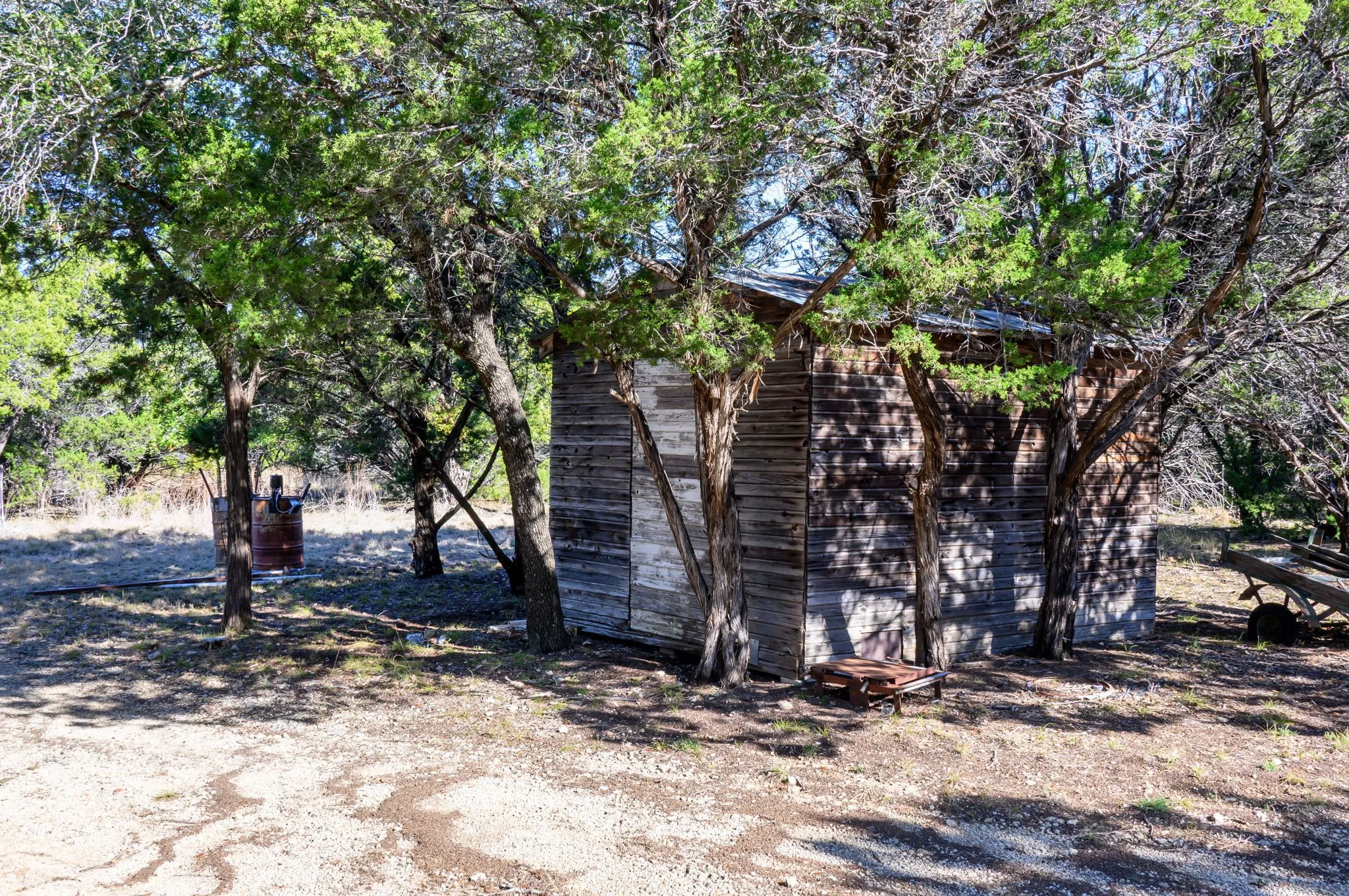 View of home's exterior featuring an outdoor structure