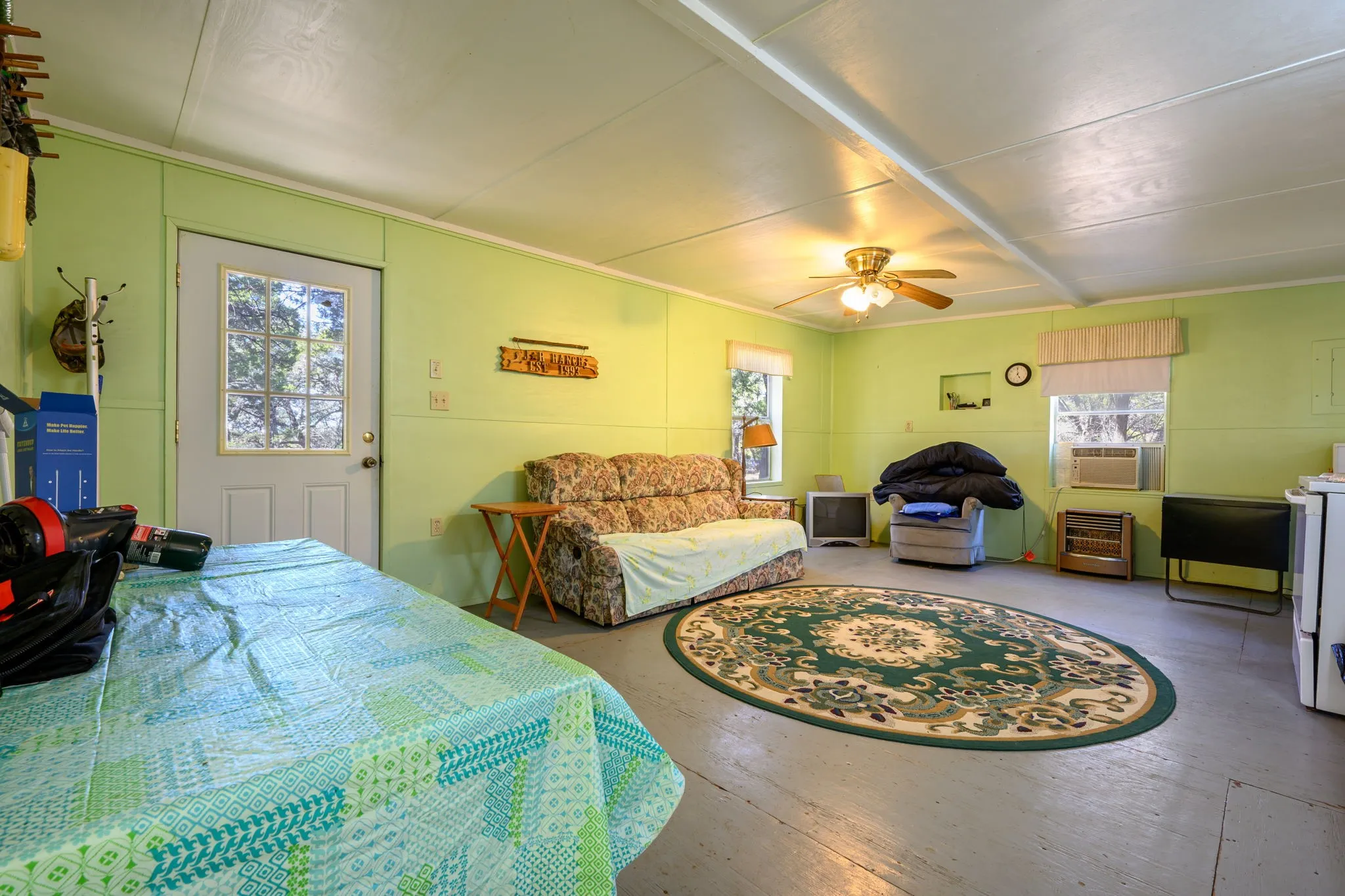 Living area featuring concrete flooring