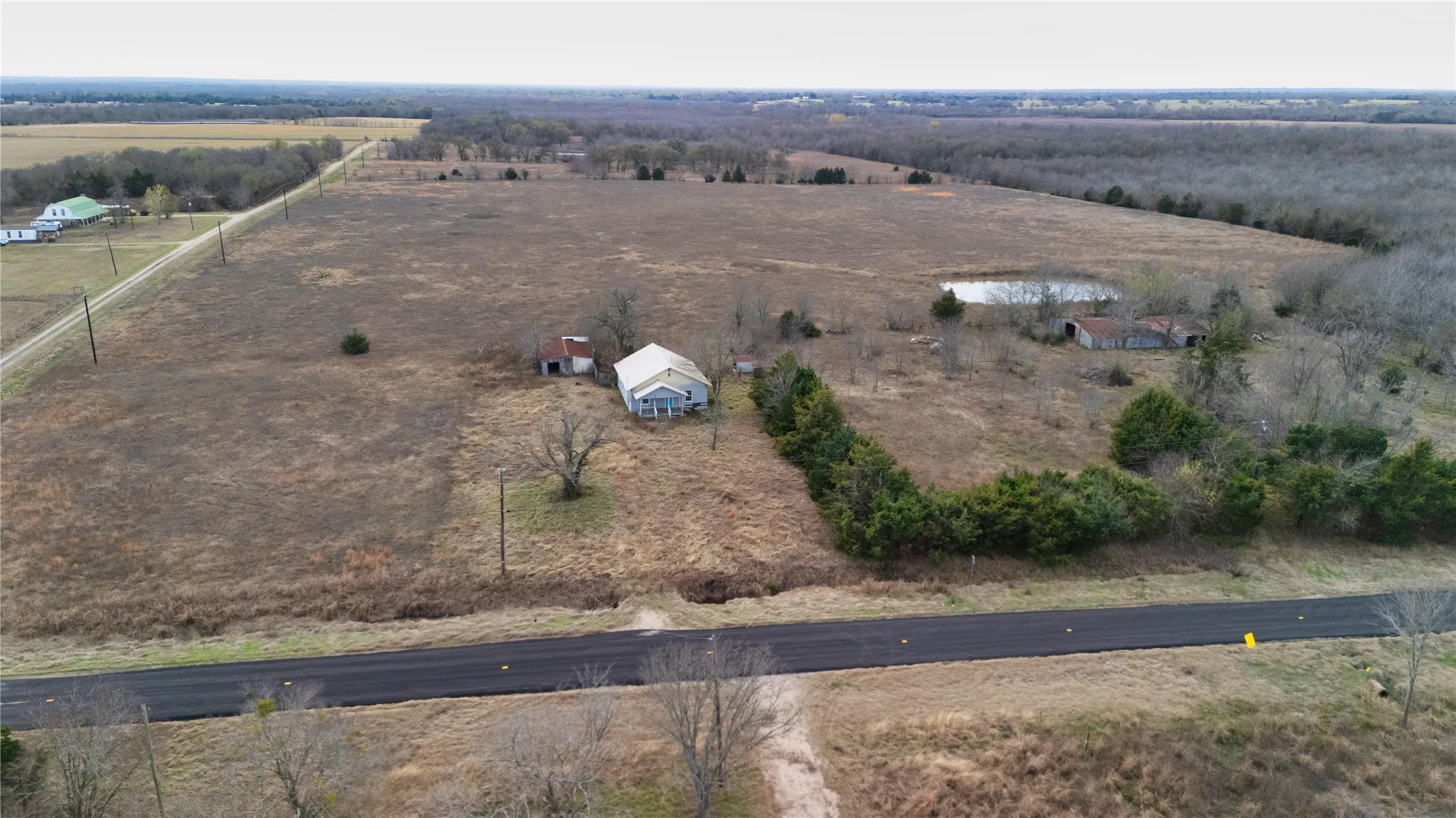 Aerial view of property's location featuring rural landscape