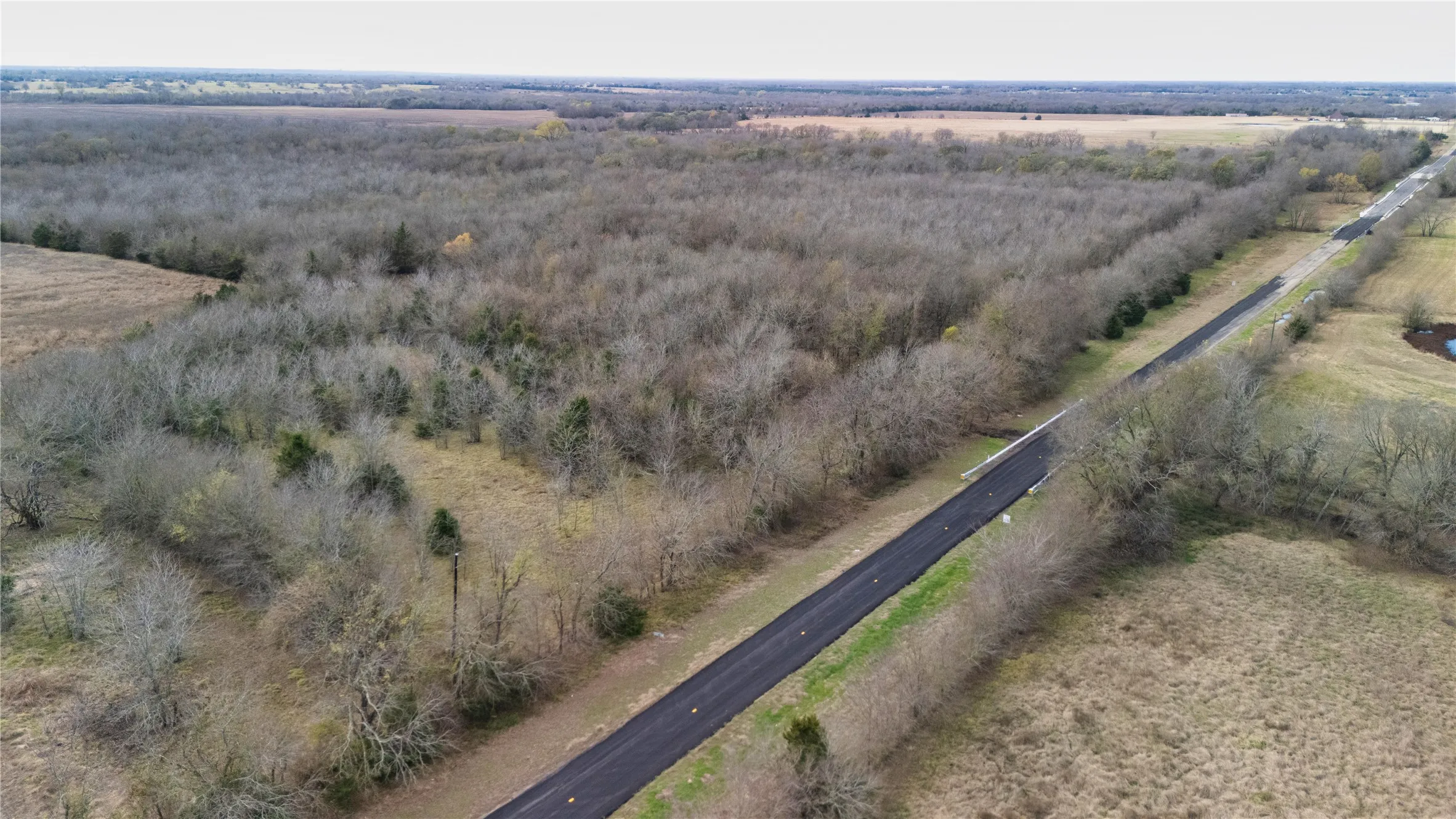 Aerial overview of property's location featuring rural landscape