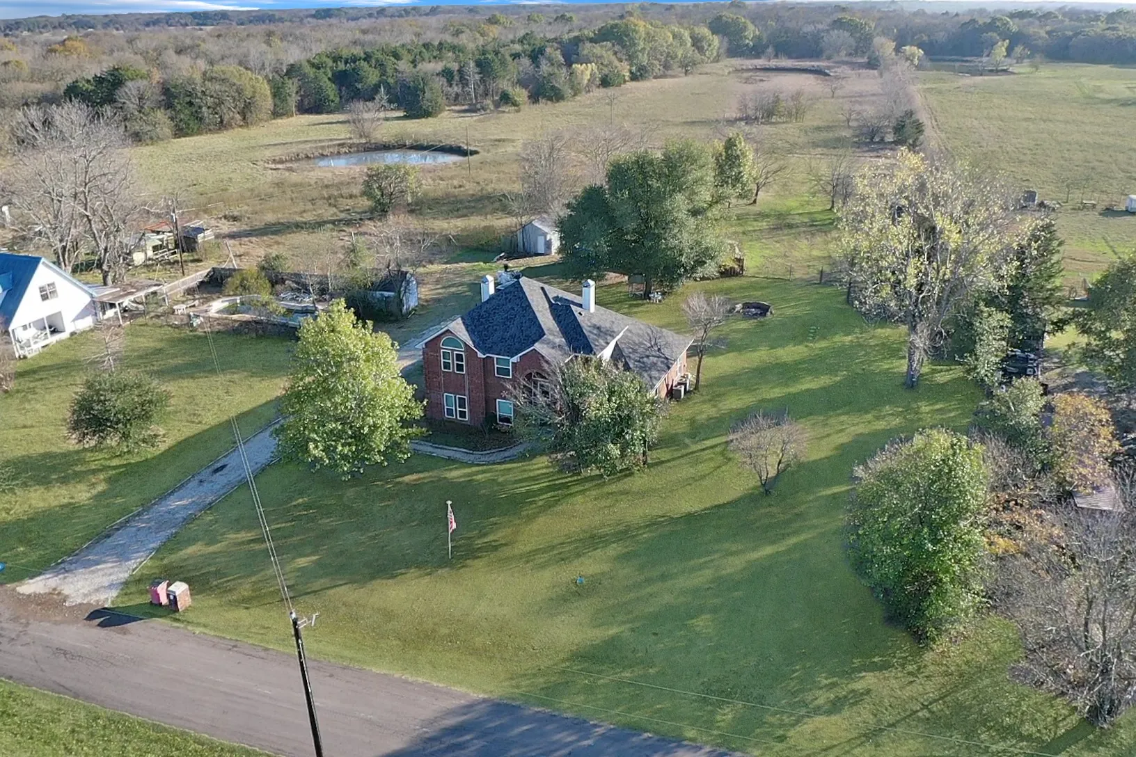 Aerial view of property's location with rural landscape