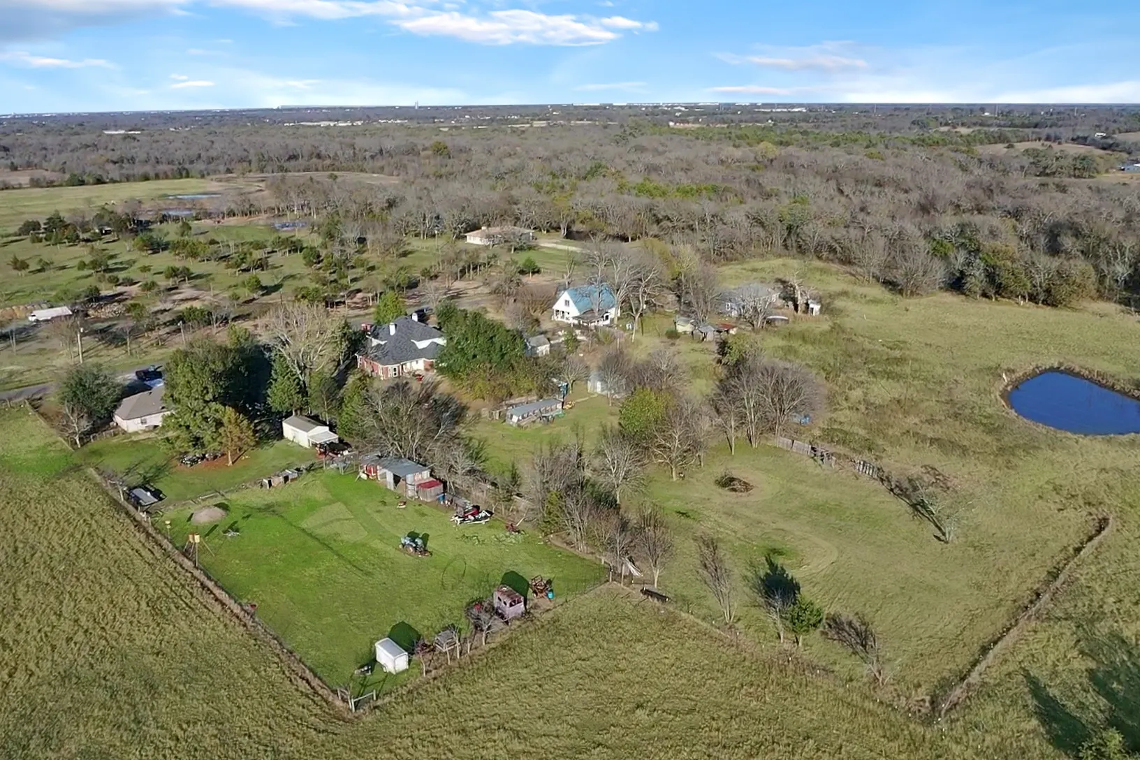 Aerial overview of property's location with a forest