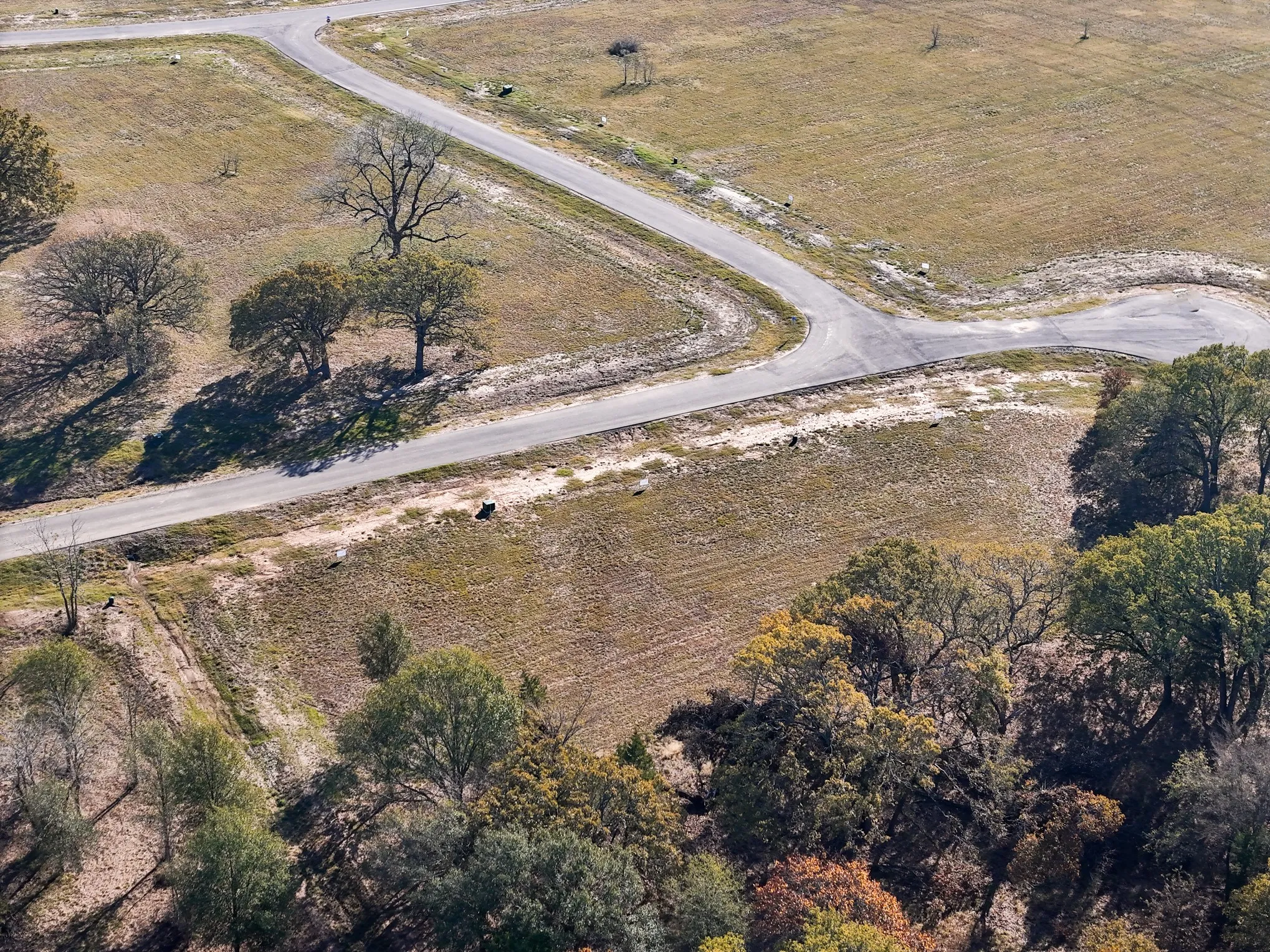 Aerial view of property and surrounding area featuring rural landscape