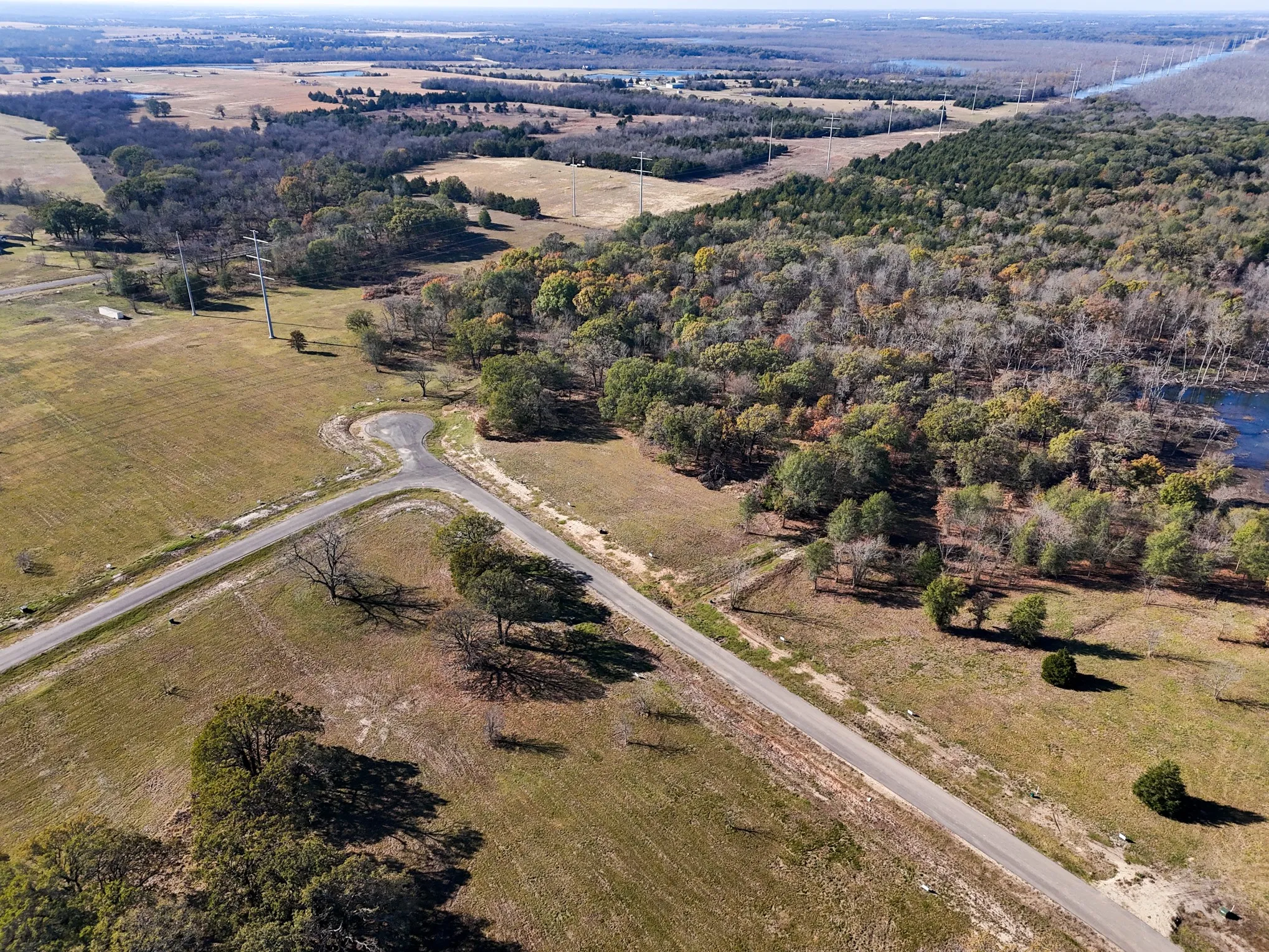 Aerial view of property and surrounding area with rural landscape