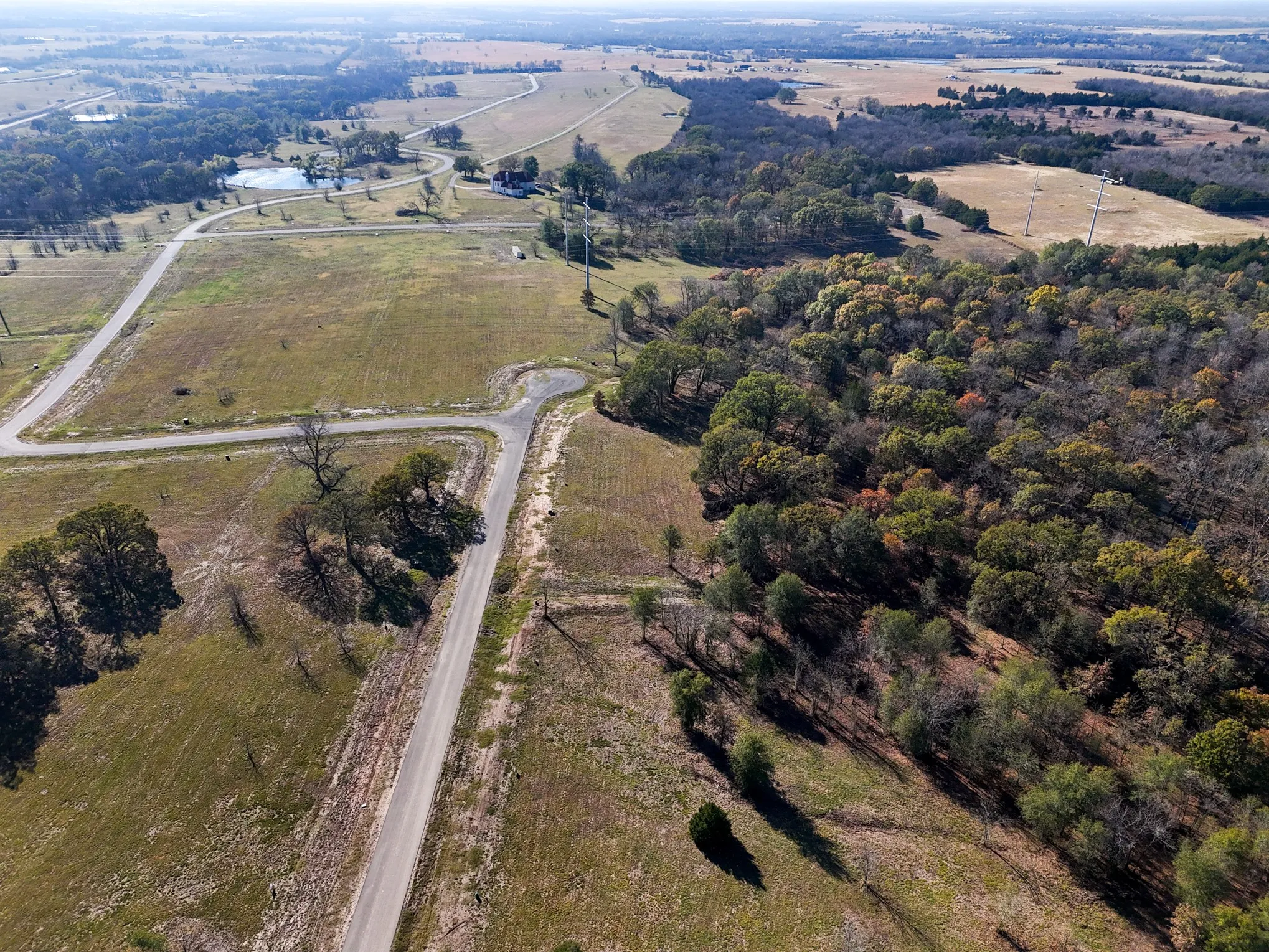 Aerial view of property's location with rural landscape