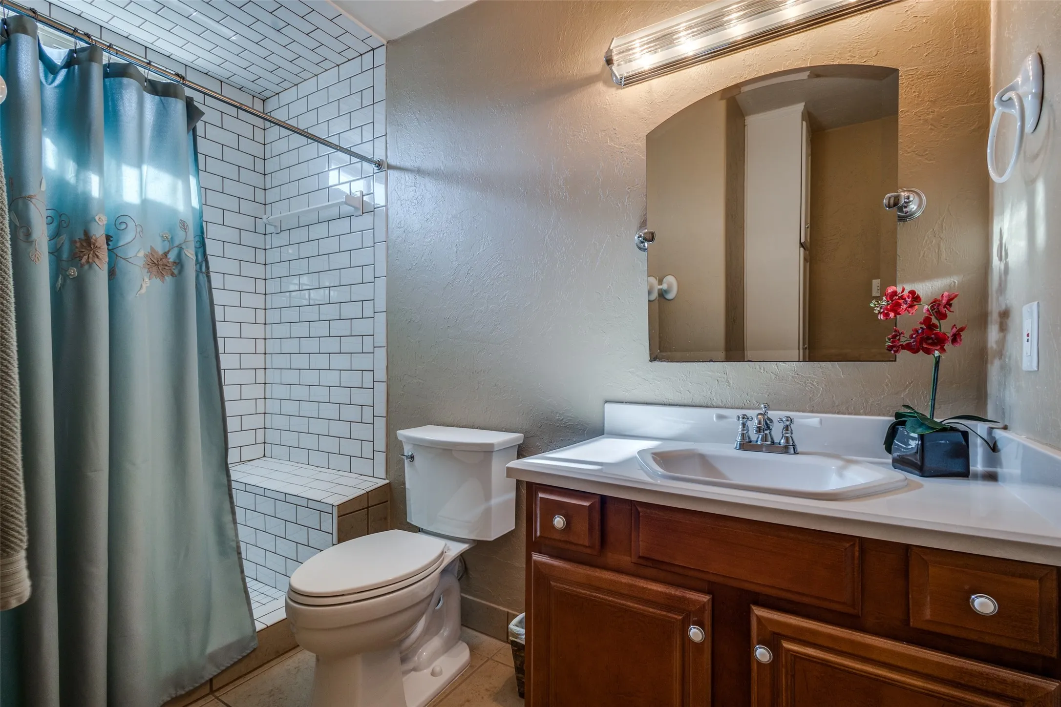 Third full bath with access from office or the guest suite.
