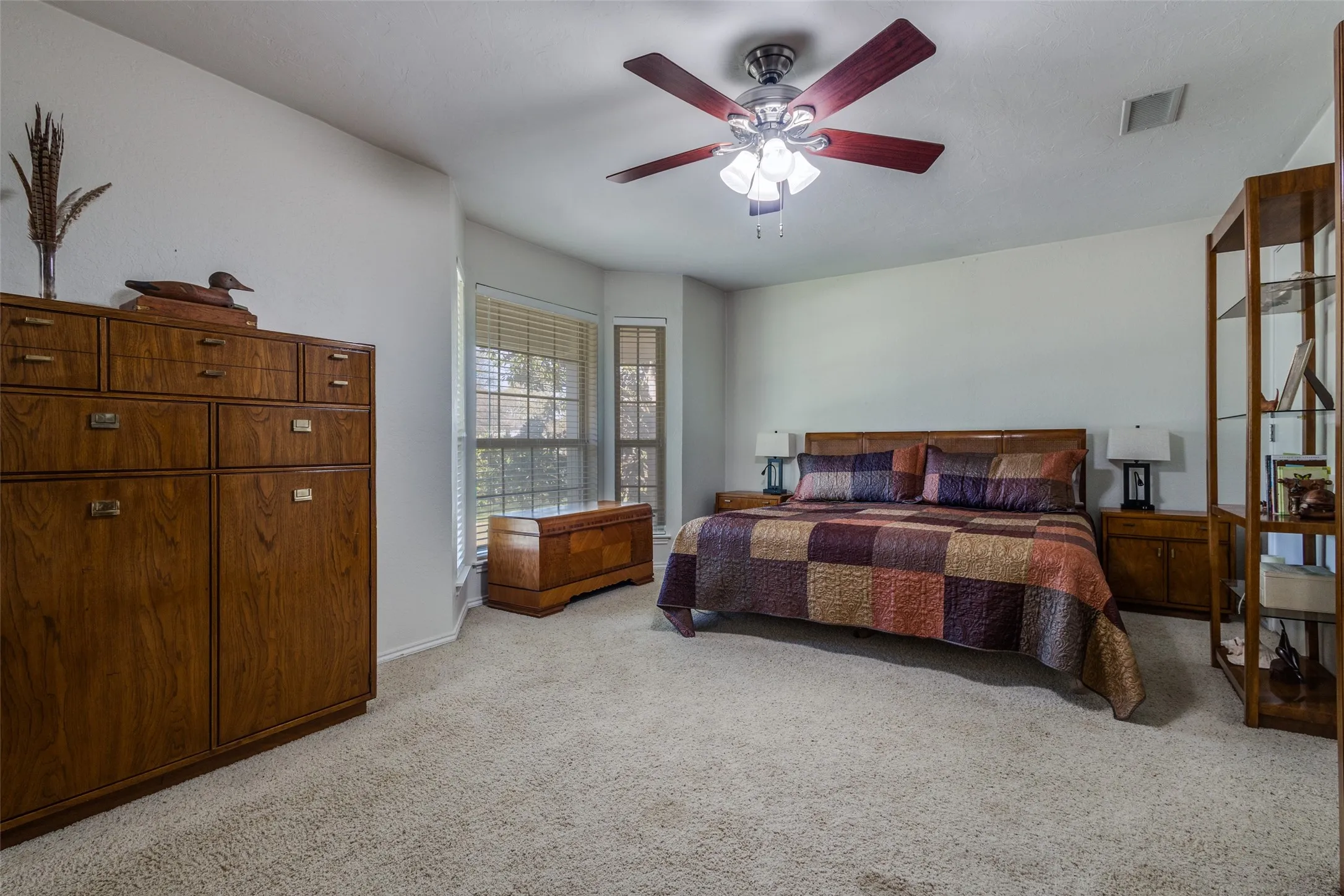 Primary suite has lots or room that creates a relaxing atmosphere.