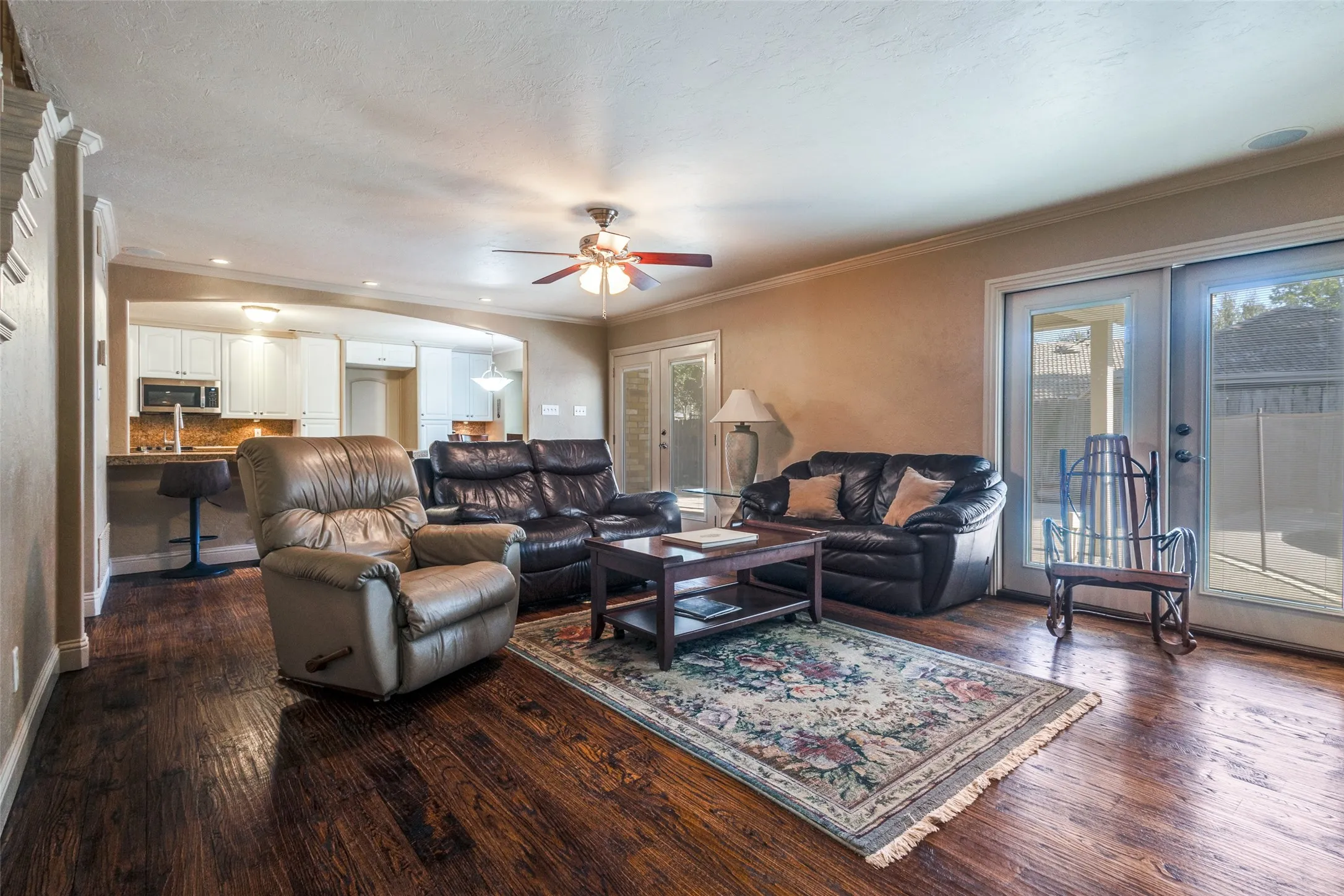 From the office to the living room.  lots of natural light and access to the rear porch, patio and Pool.
