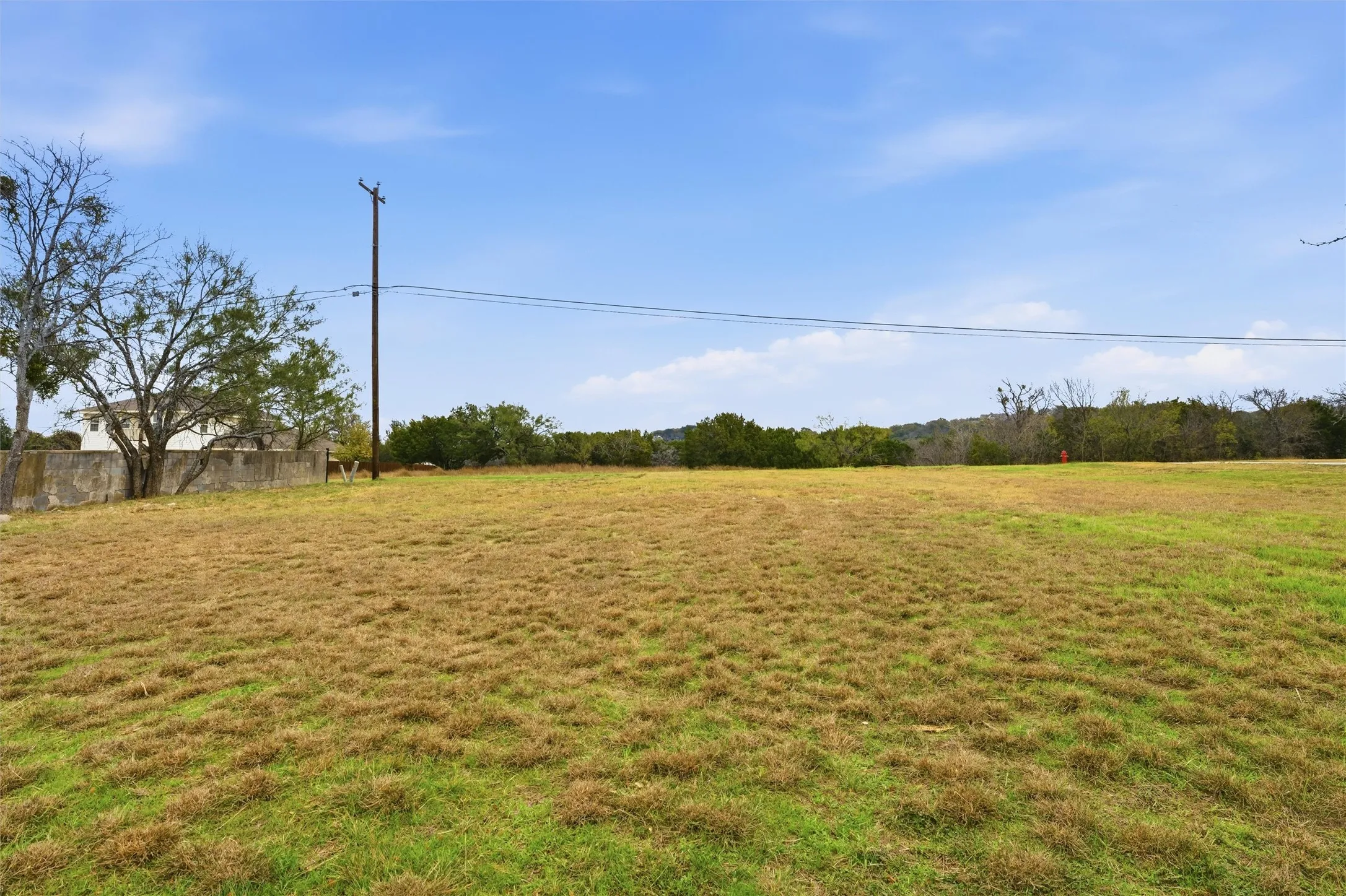 View of grassy yard with a view of countryside