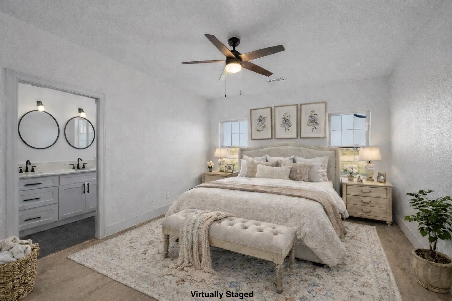 Bedroom featuring a ceiling fan and wood finished floors