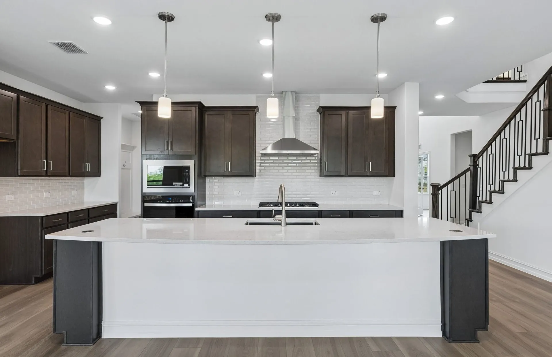 Kitchen with eat-in bartop island