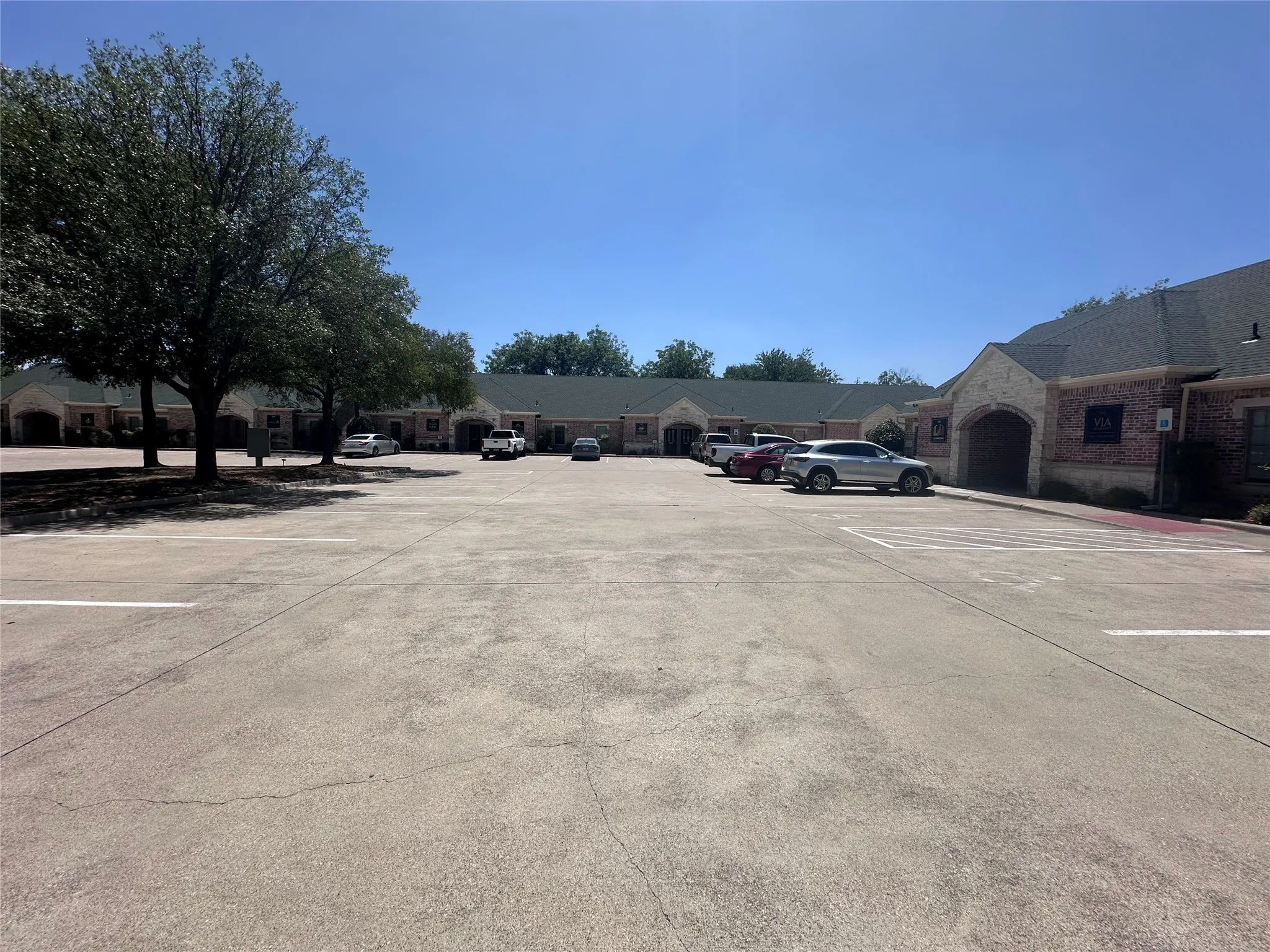 2 dedicated parking spots in front of unit & open parking elsewhere