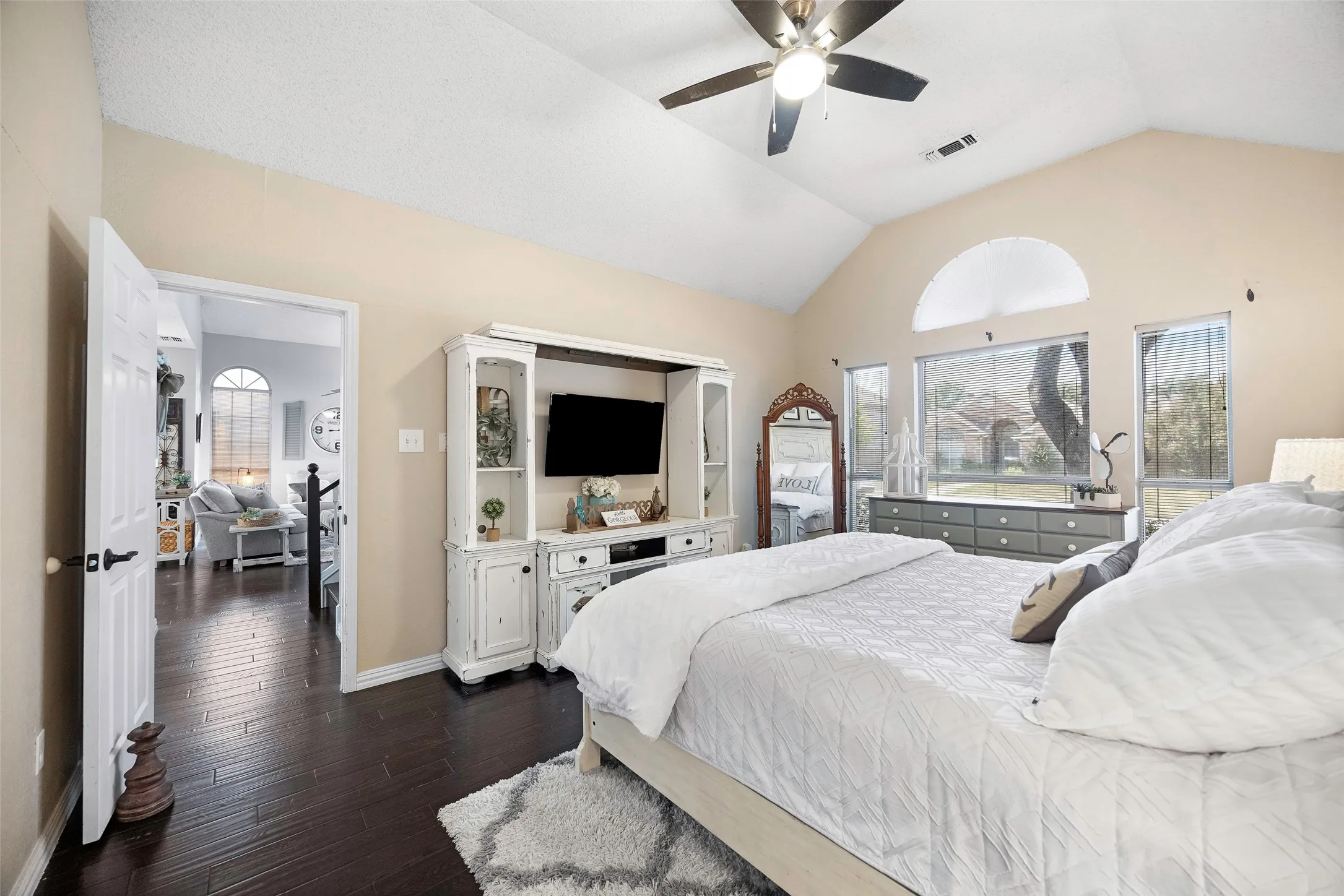 Primary bedroom features ensuite updated bath