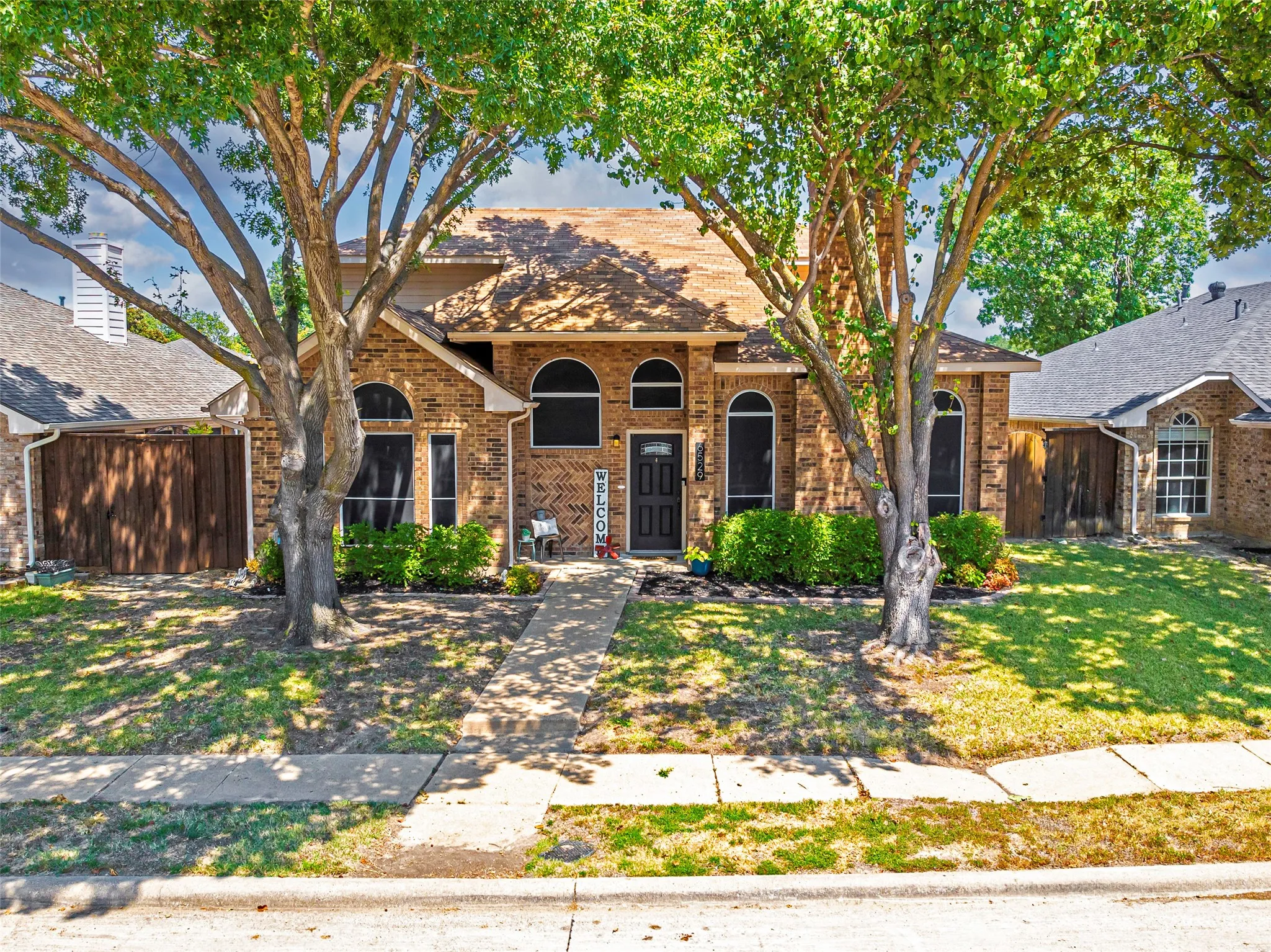 Great curb appeal with great shade trees