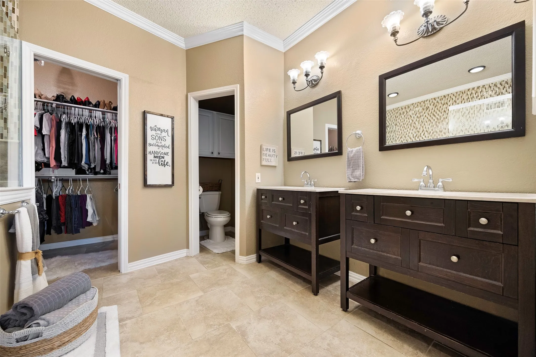 Updated ensuite bath with dual sinks and walk in closet