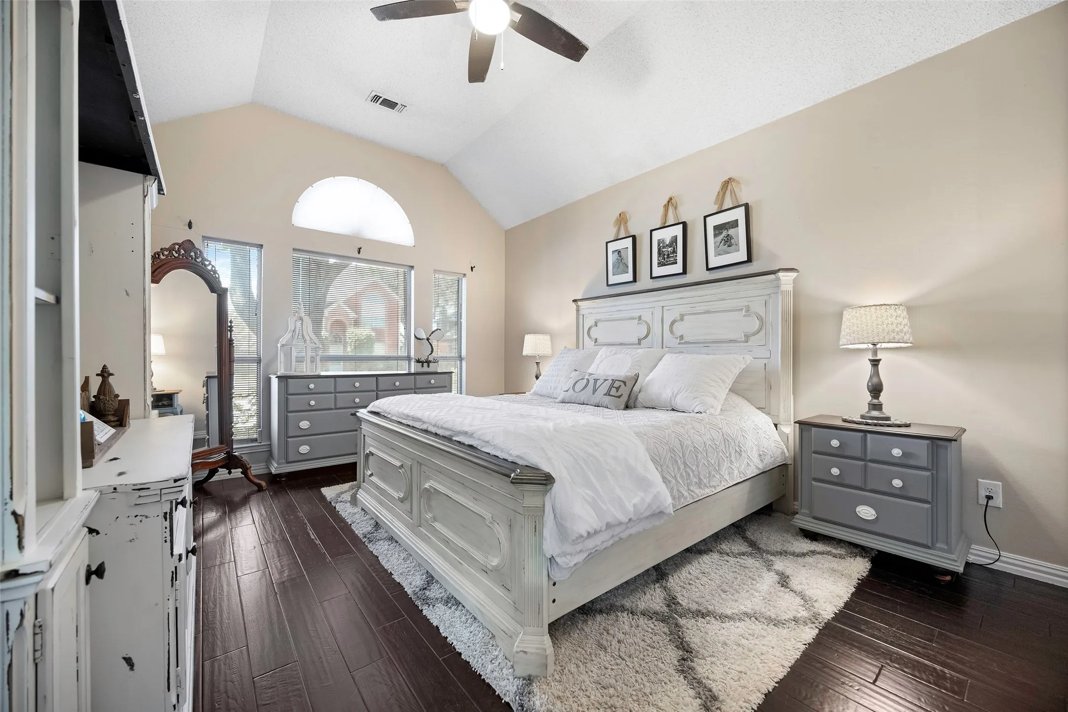This spacious primary suite is large enough for all of your oversized furniture