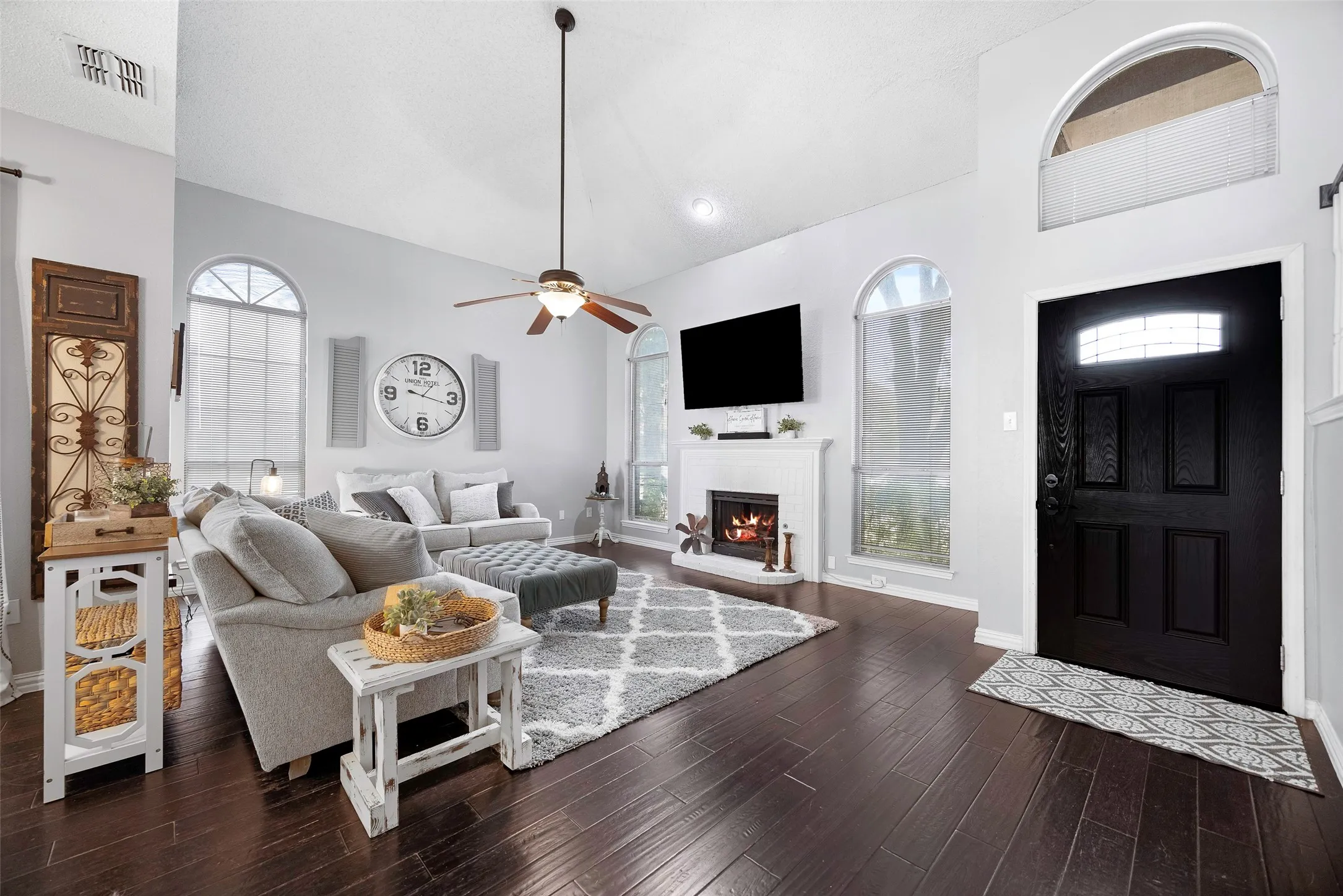 Wood floors and open floor plan welcome you to this beauty