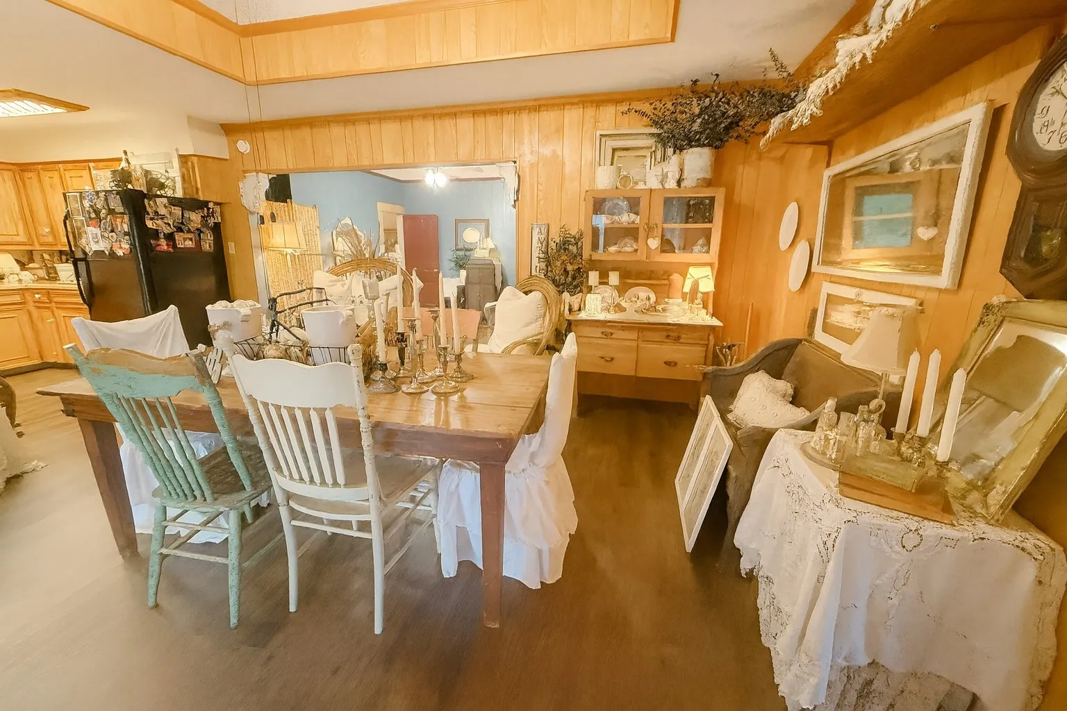 Dining area with wood paneling walls