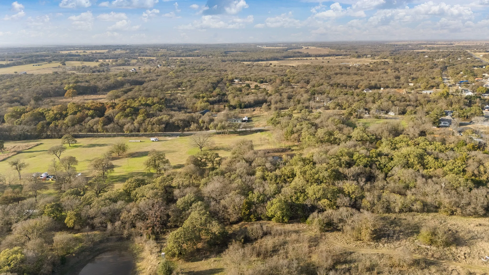 View of property location with a forest