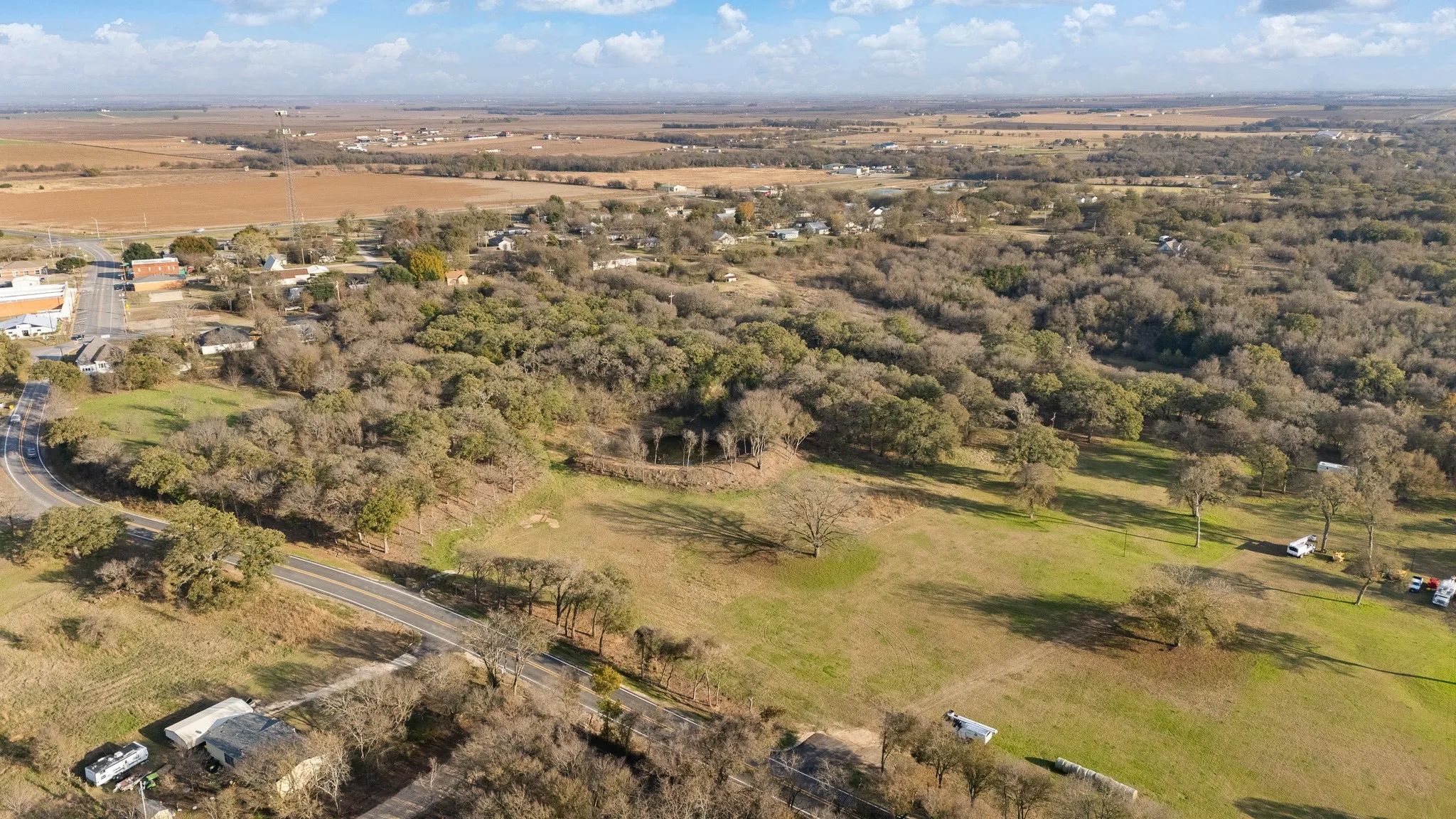 Aerial view of property and surrounding area with rural landscape