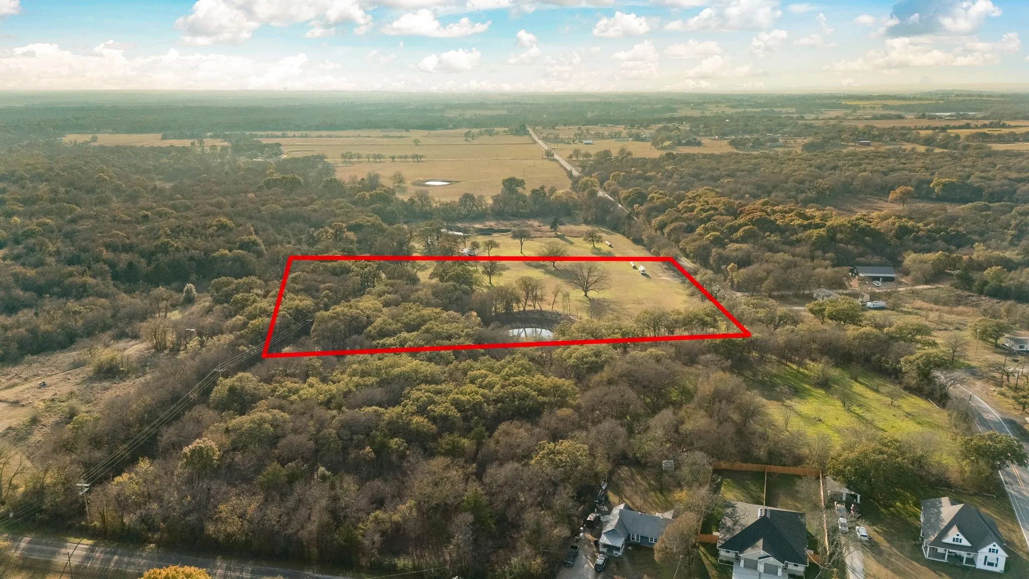 View of property location featuring property parcel outlined and rural landscape