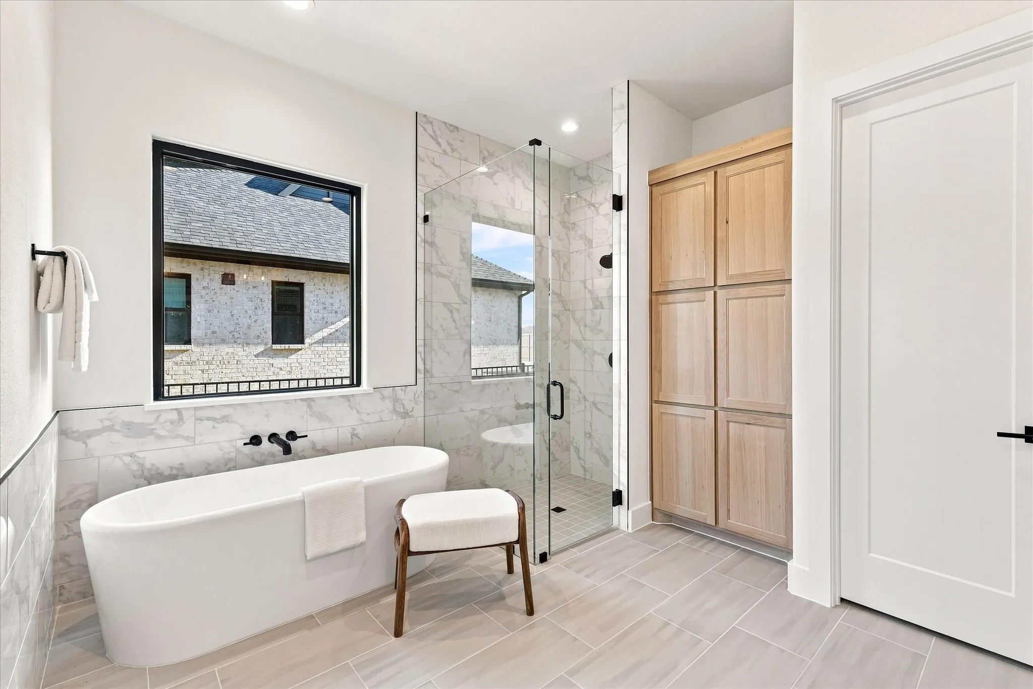 Plenty of storage and natural light.  Oversized soaker tub.