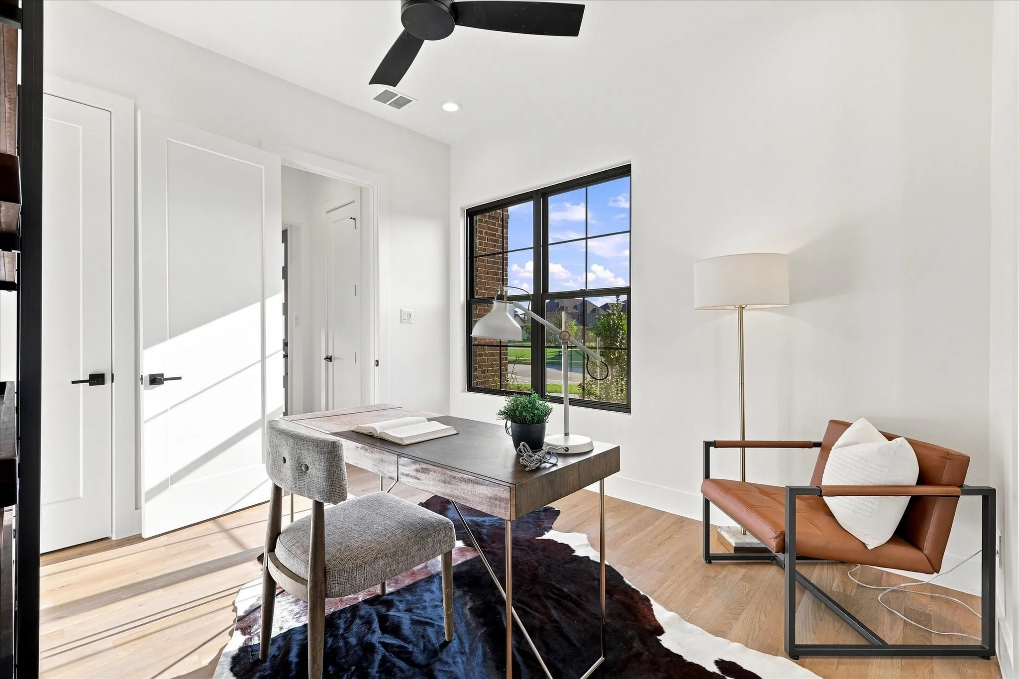 This space has a closet and full bath.  It is staged as a study but could be a guest or MIL suite.