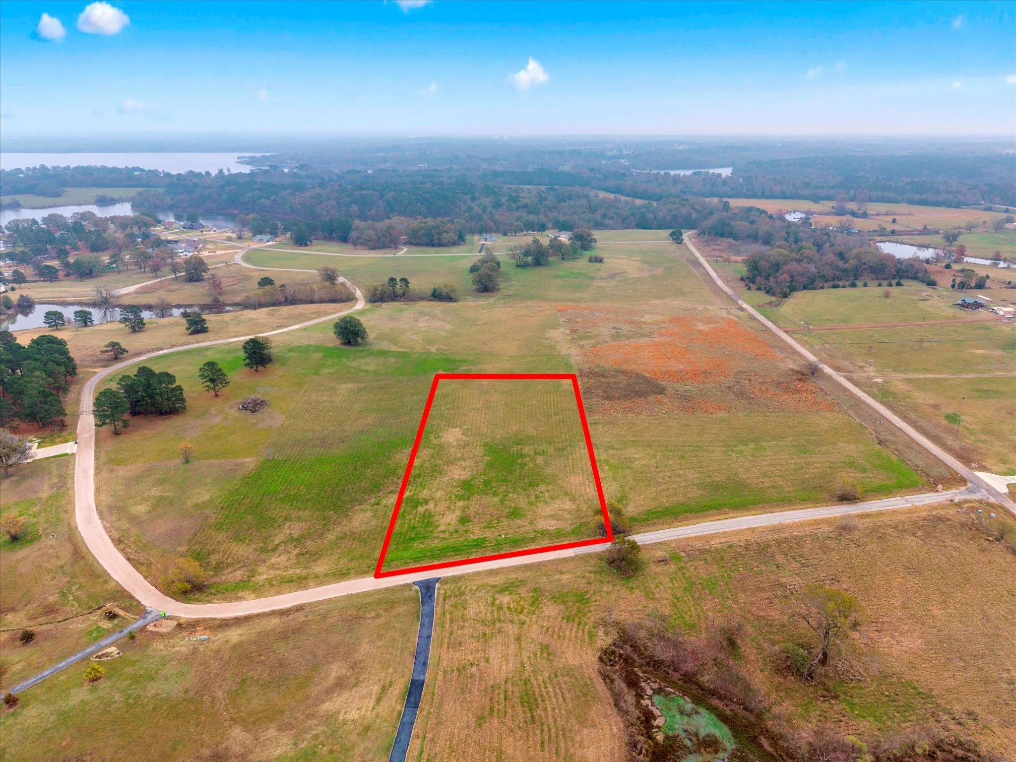 Overview of rural landscape with property parcel outlined