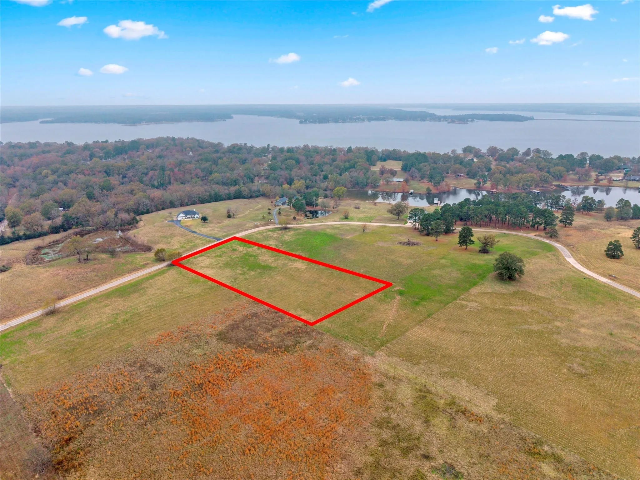 View of property location featuring property parcel outlined and a large body of water