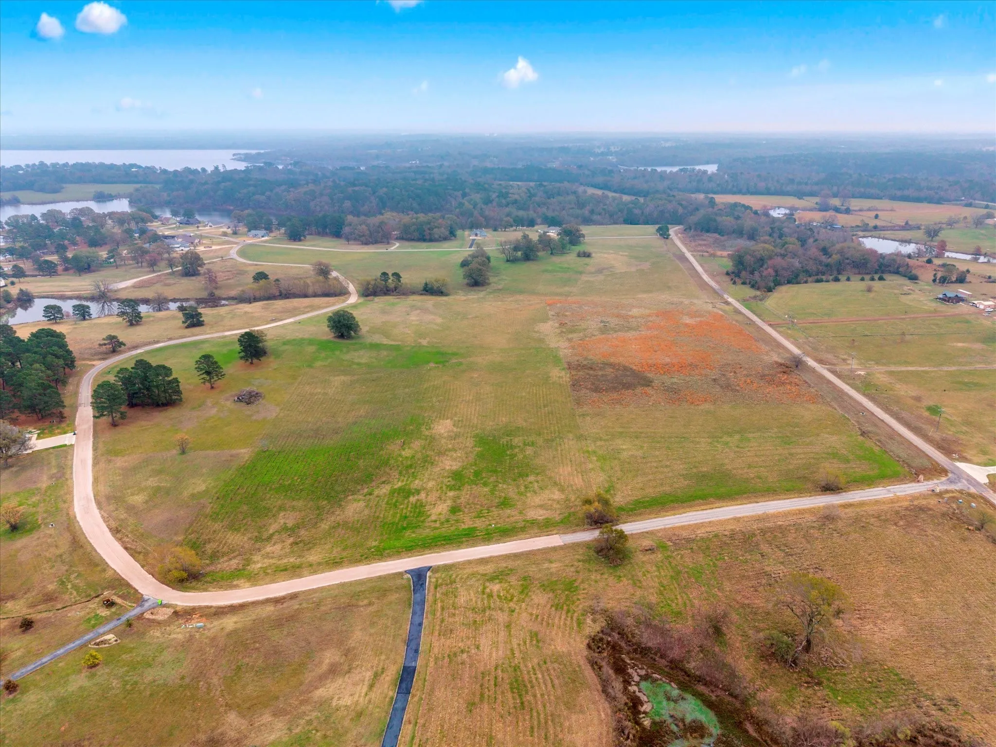 Aerial view of property and surrounding area with rural landscape