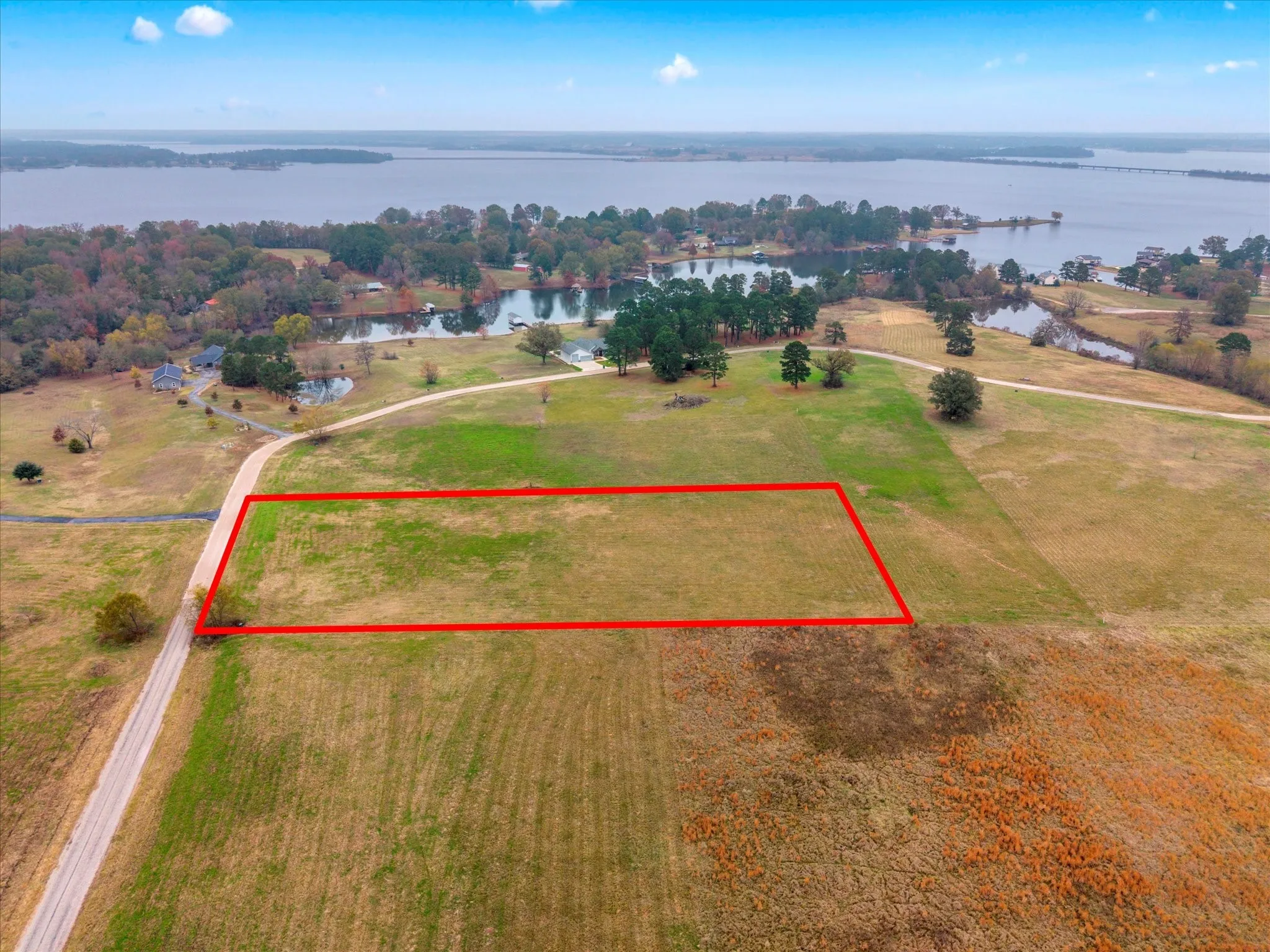 View of property location with property boundaries highlighted and a nearby body of water