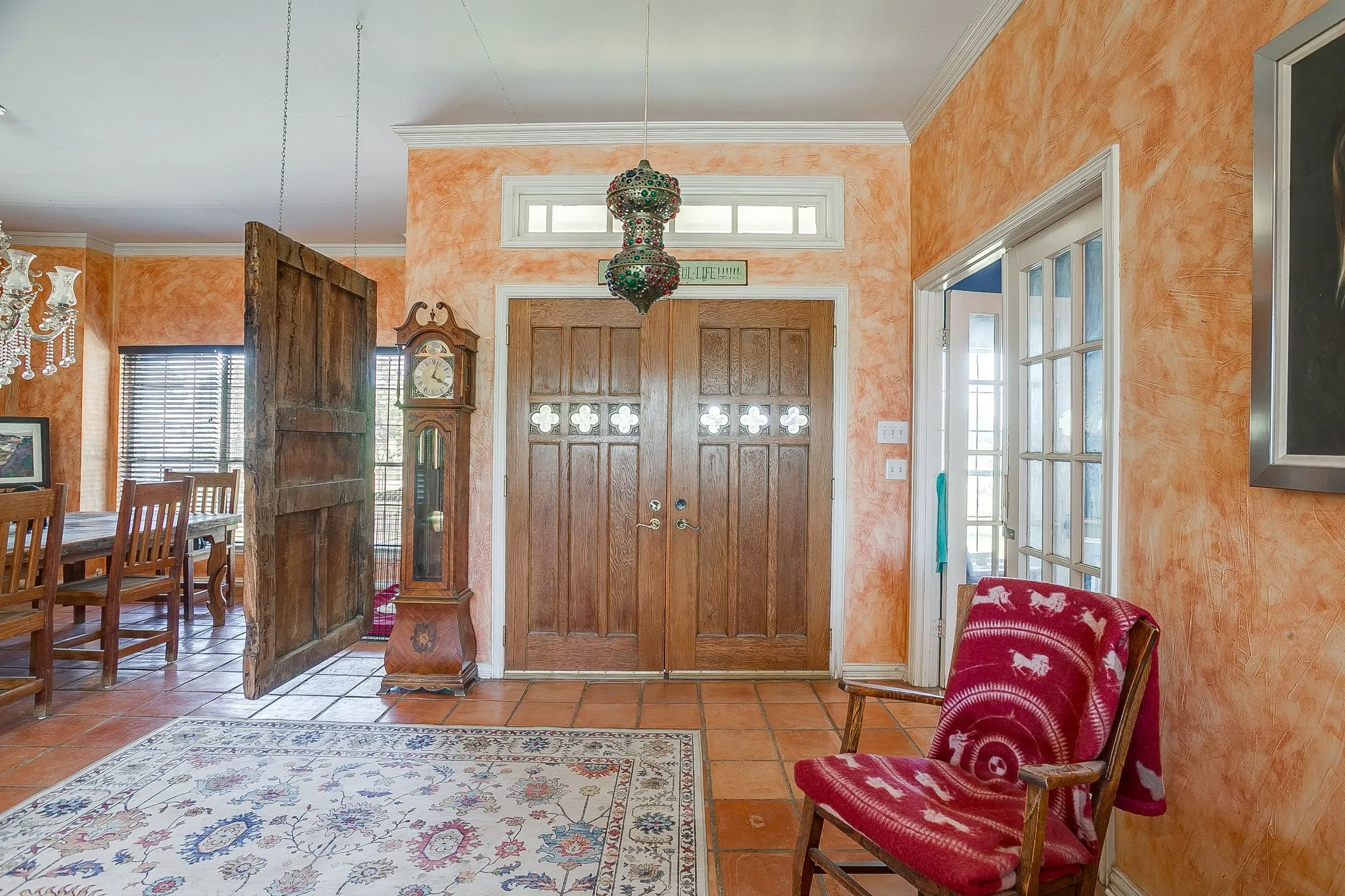 Front foyer features 100 year old doors salvaged from a church in McKinney