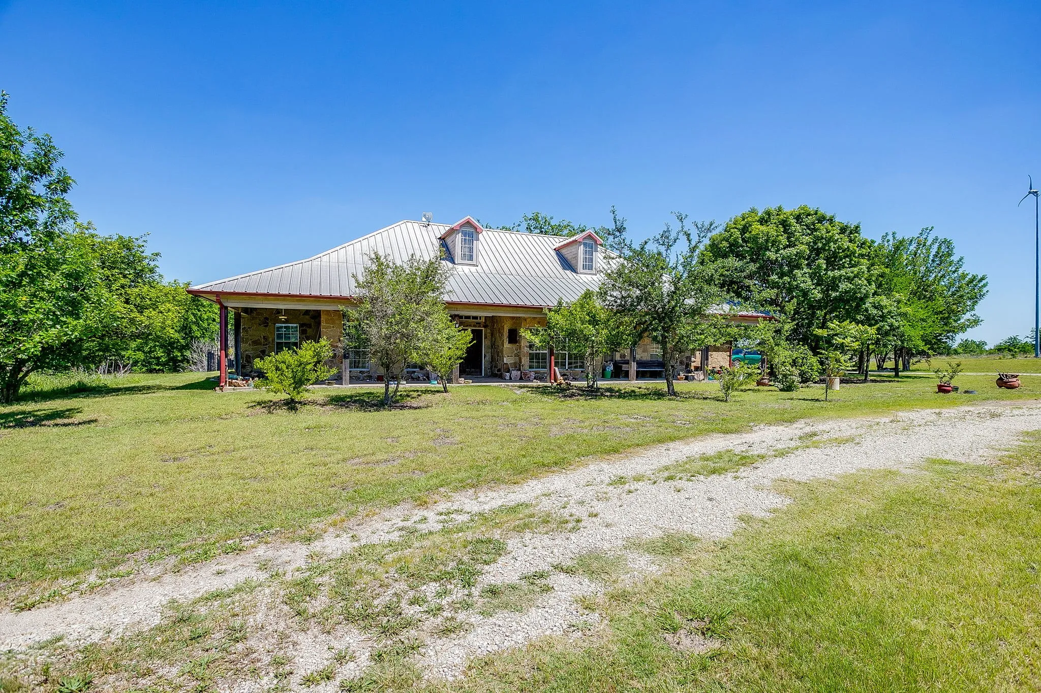 Oklahoma sandstone house with metal roof