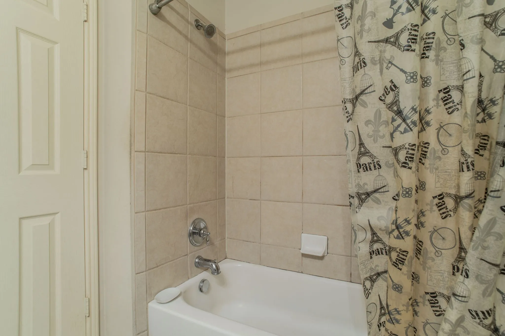 Full bathroom featuring shower / tub combo with curtain