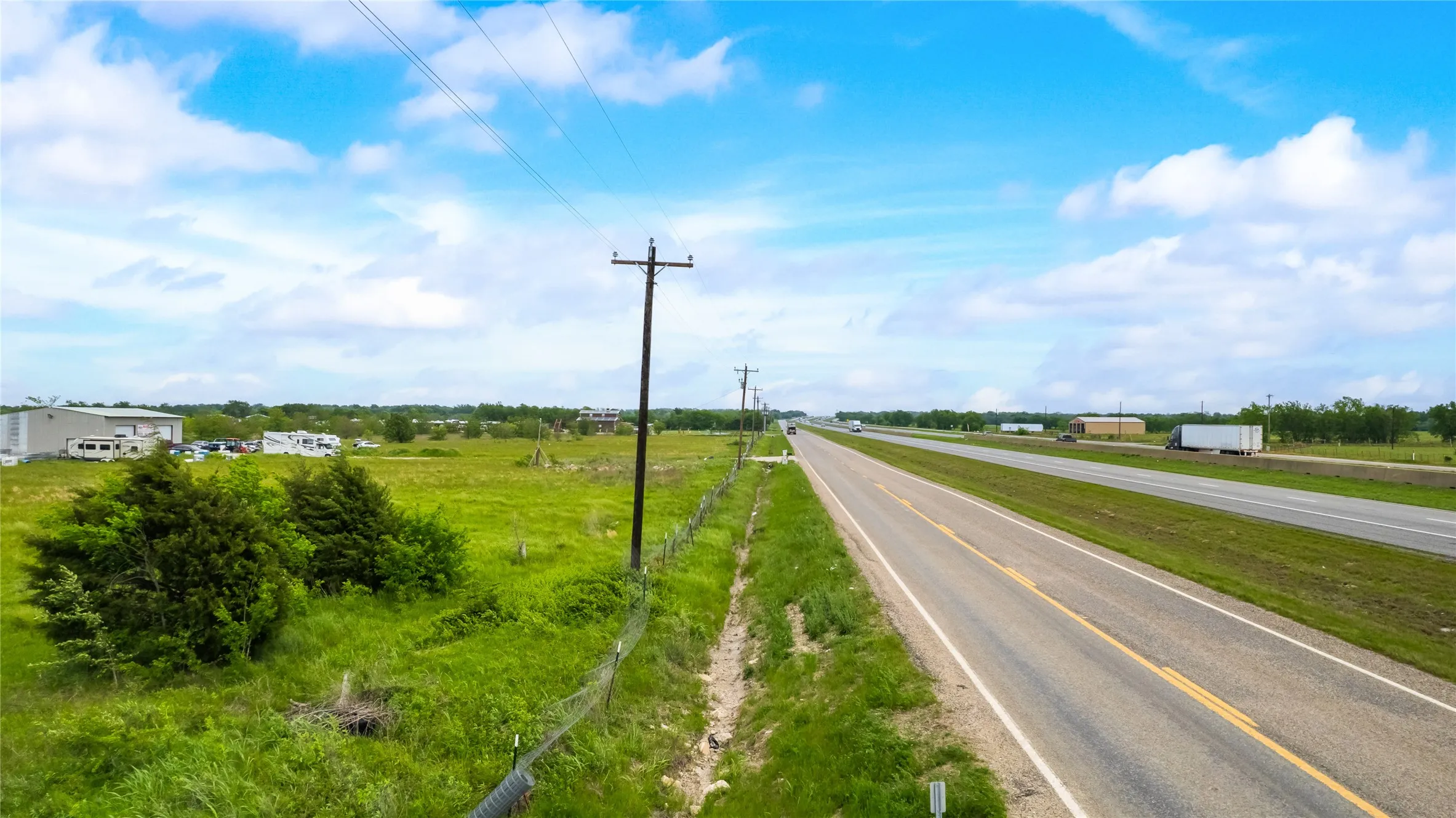 View of asphalt street with a view of countryside