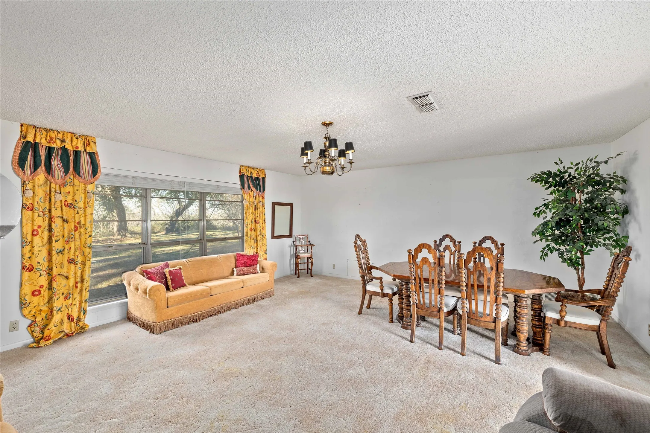Living room with space for additional dining