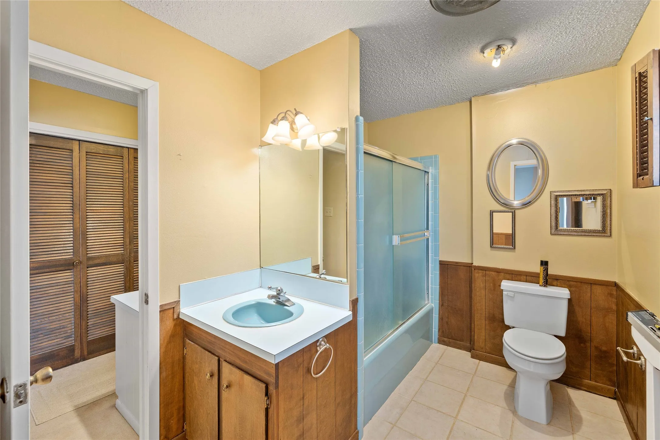 Unique primary bathroom with split design