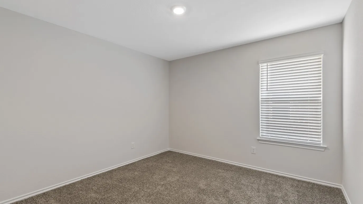 Spare room with carpet flooring and baseboards