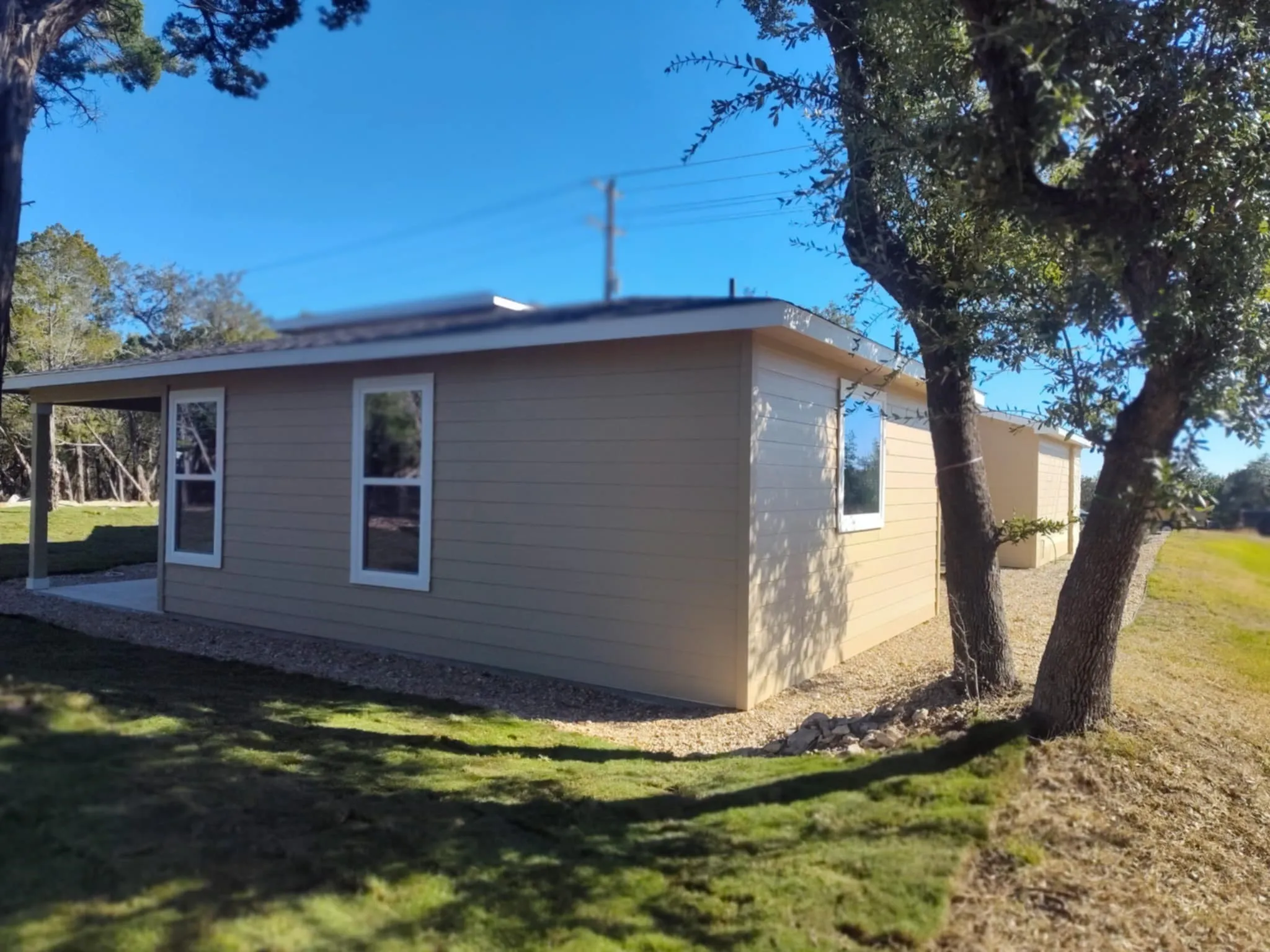 View of home's exterior with a lawn