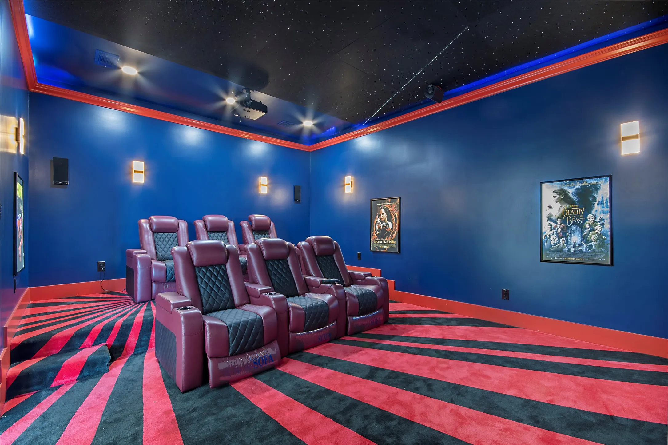 Cinema with crown molding and carpet flooring