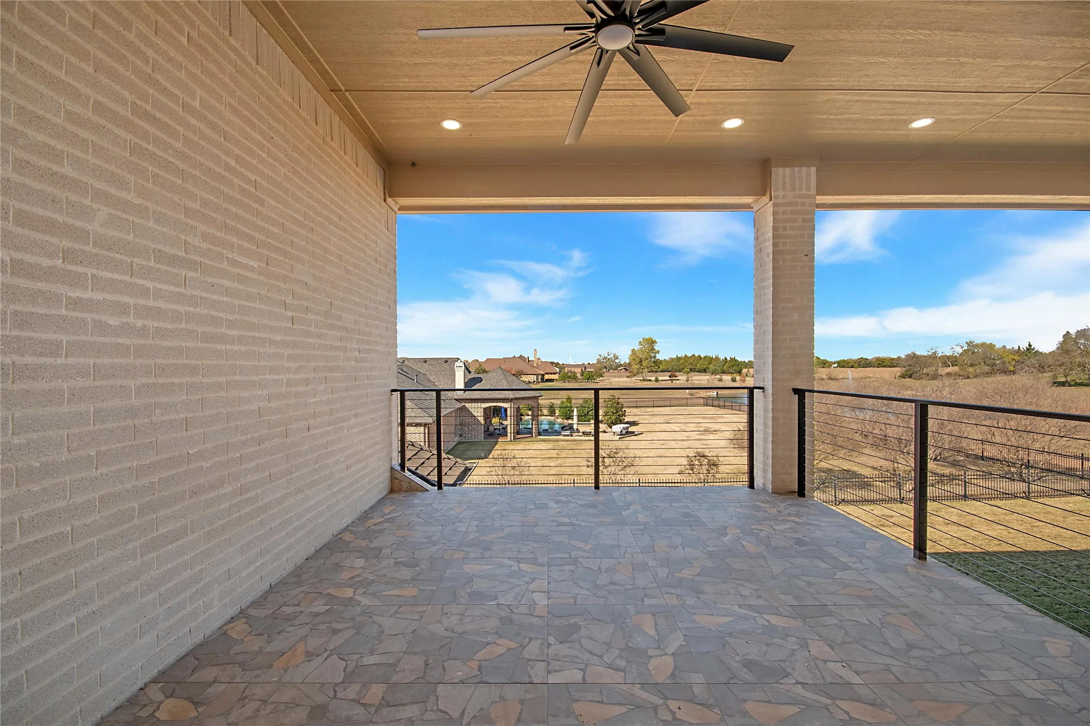 View of patio / terrace featuring a ceiling fan