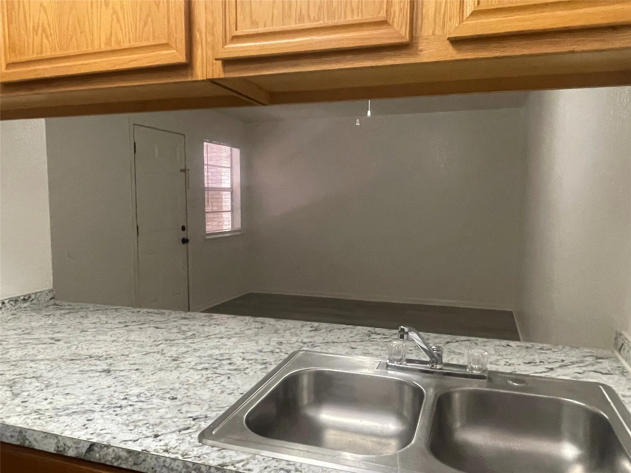 Kitchen with light countertops