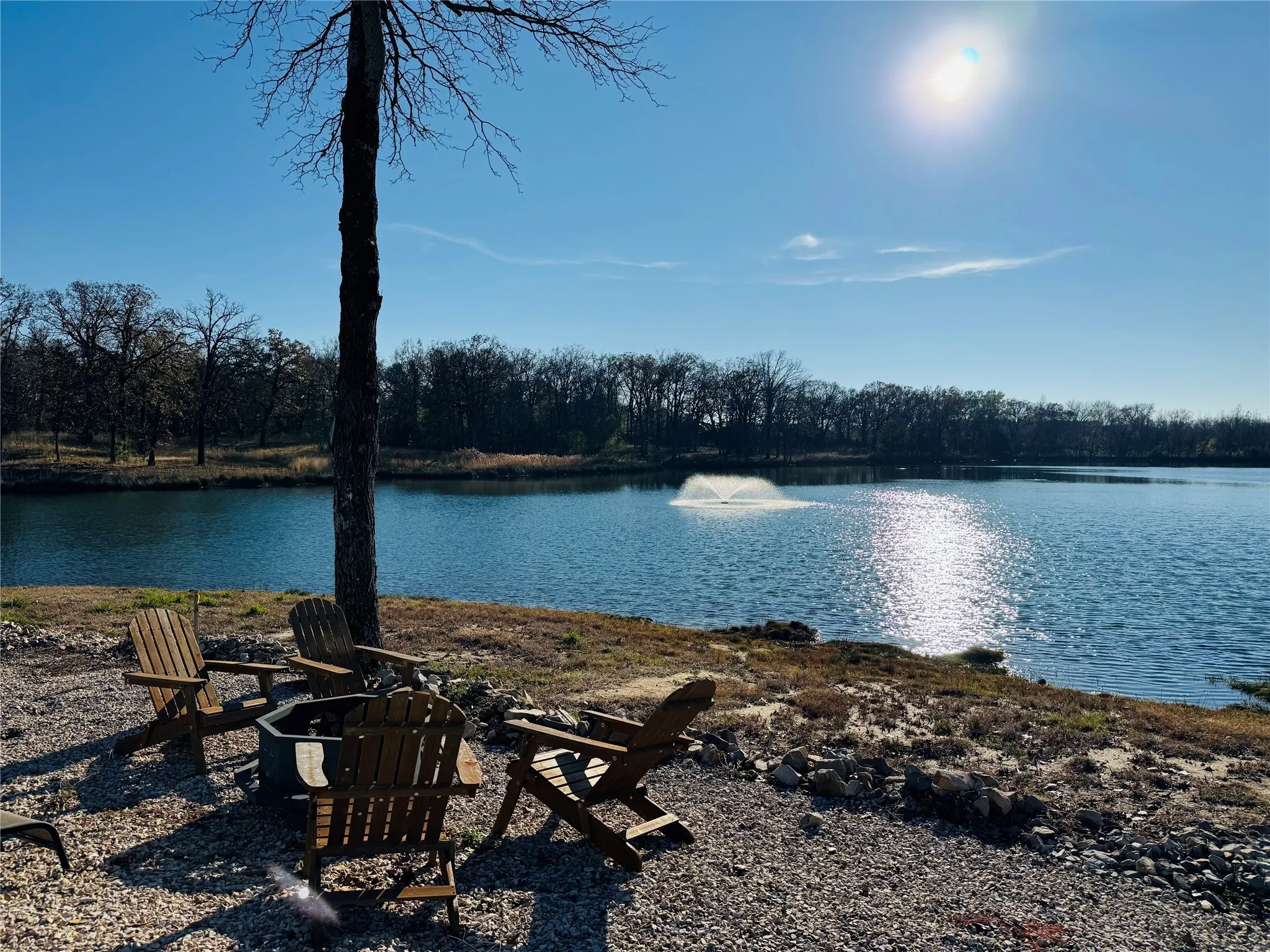 Water view featuring an outdoor fire pit